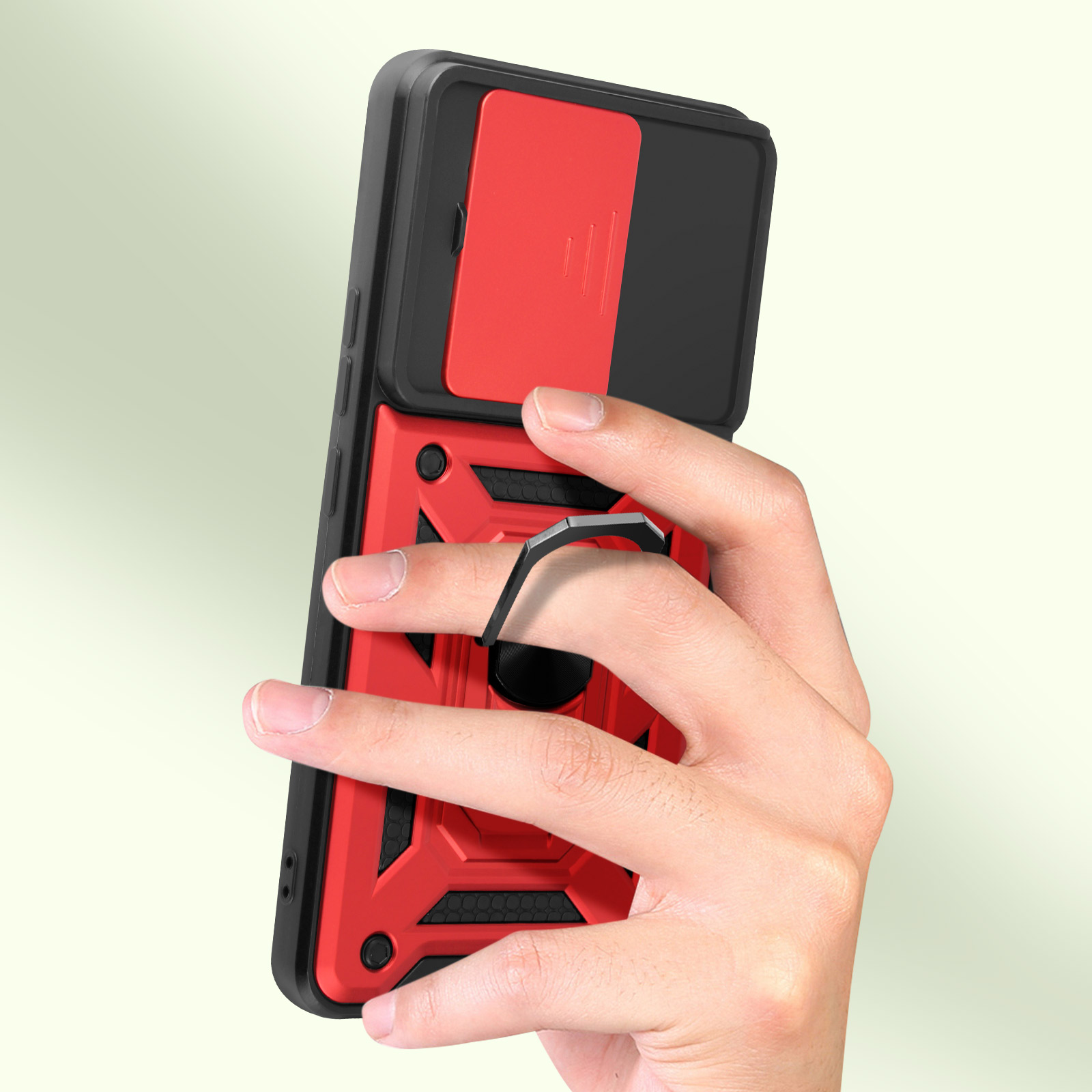Custodia per telefono rossa e nera con un anello per le dita. Una mano tiene il telefono.