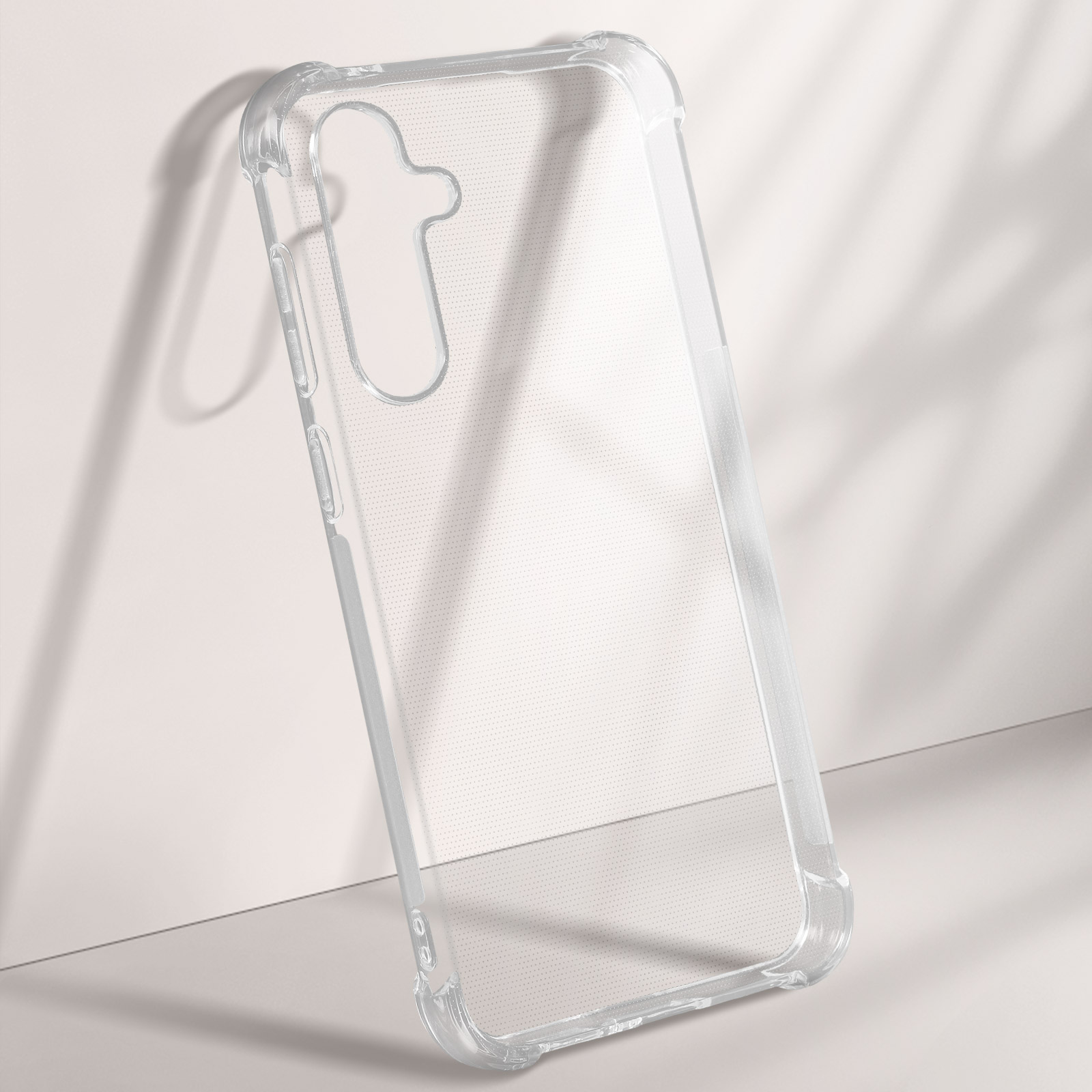 Custodia trasparente per telefono appoggiata su una superficie bianca, che mostra forma e design.