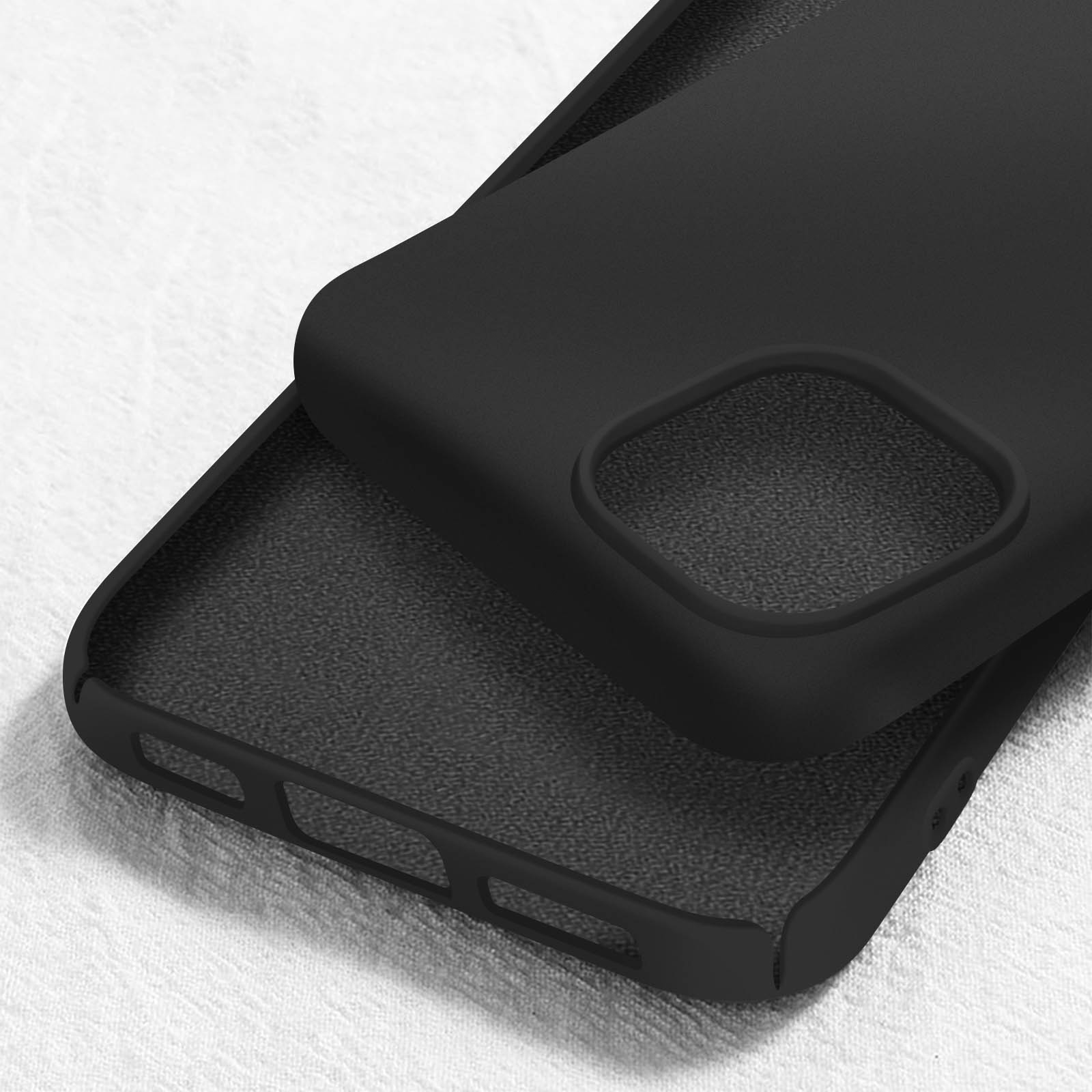Custodia per telefono nera. La custodia è di colore nero tinta unita e si trova su una superficie bianca.