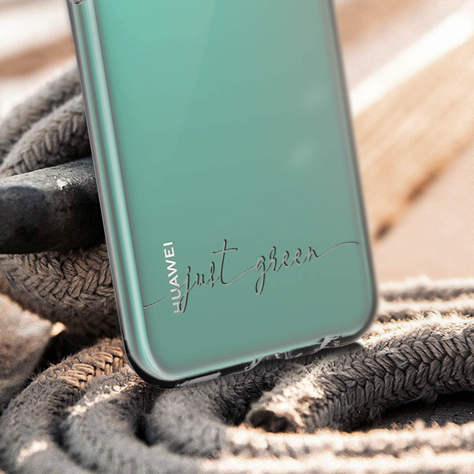 Custodia trasparente con tinta verde, testo 'just green'.