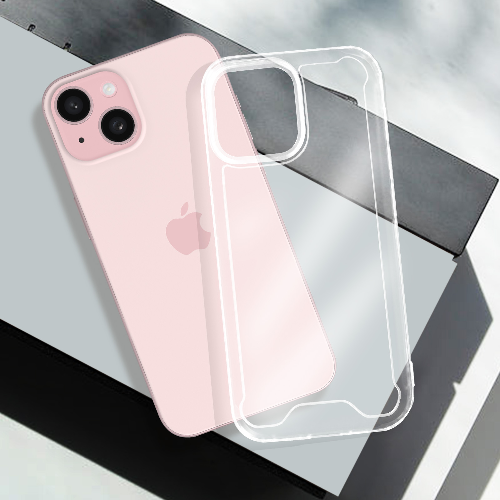 Telefono rosa e custodia trasparente su superficie grigia. Il telefono ha due fotocamere. La custodia è trasparente.