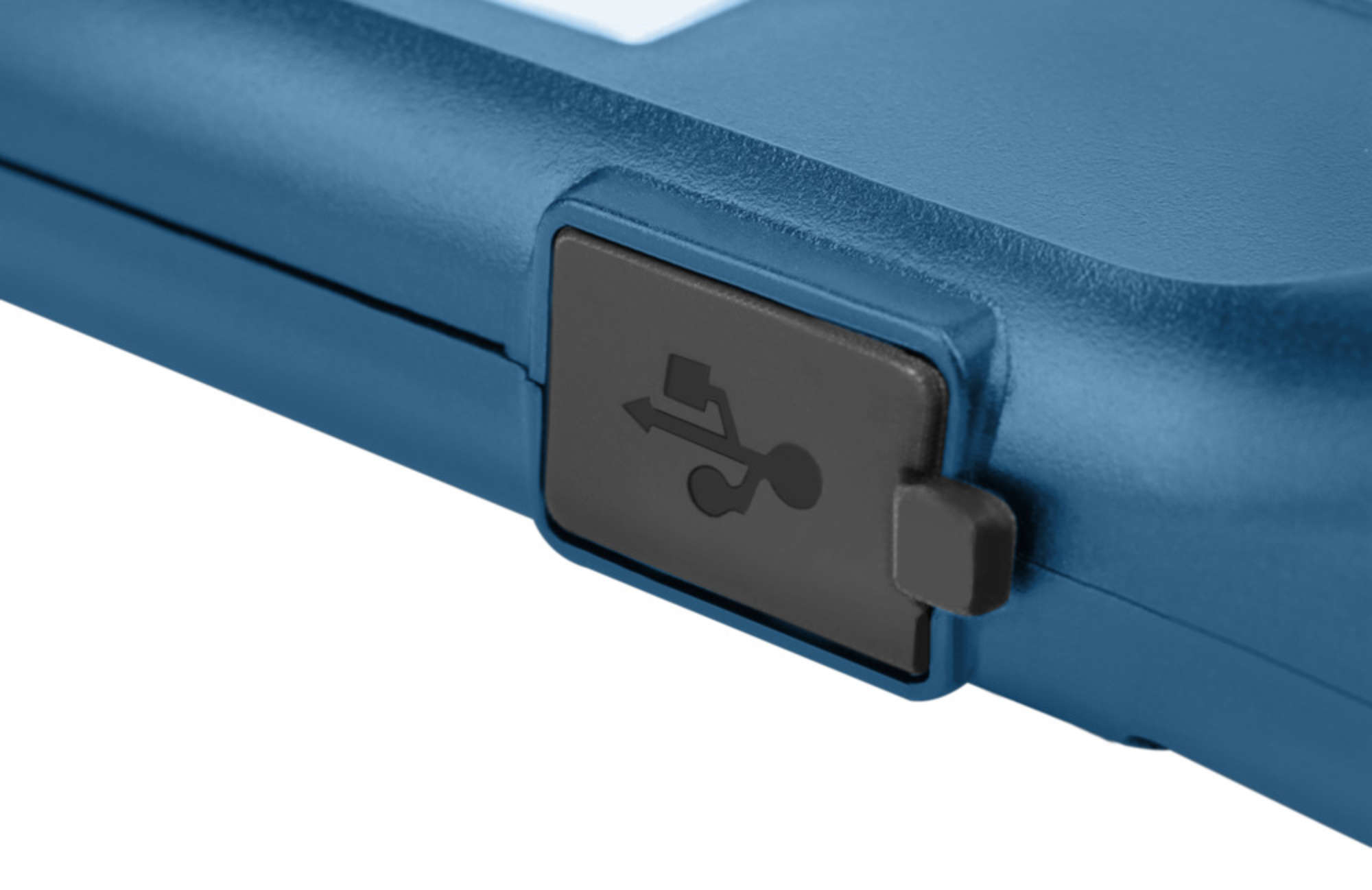 Gros plan d'un appareil bleu avec un port USB. Le port a un symbole USB.
