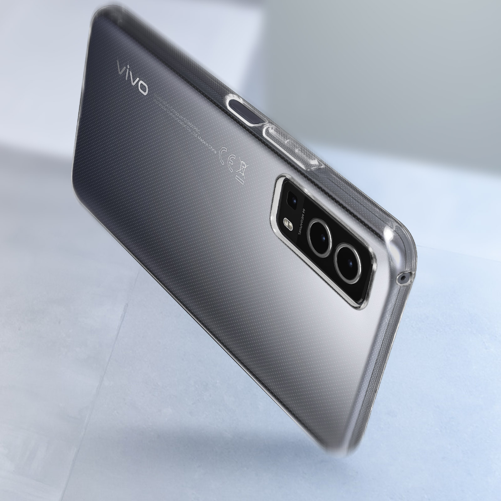 Custodia trasparente su un telefono. Il telefono è grigio e ha il logo 'VIVO'. La custodia è trasparente.