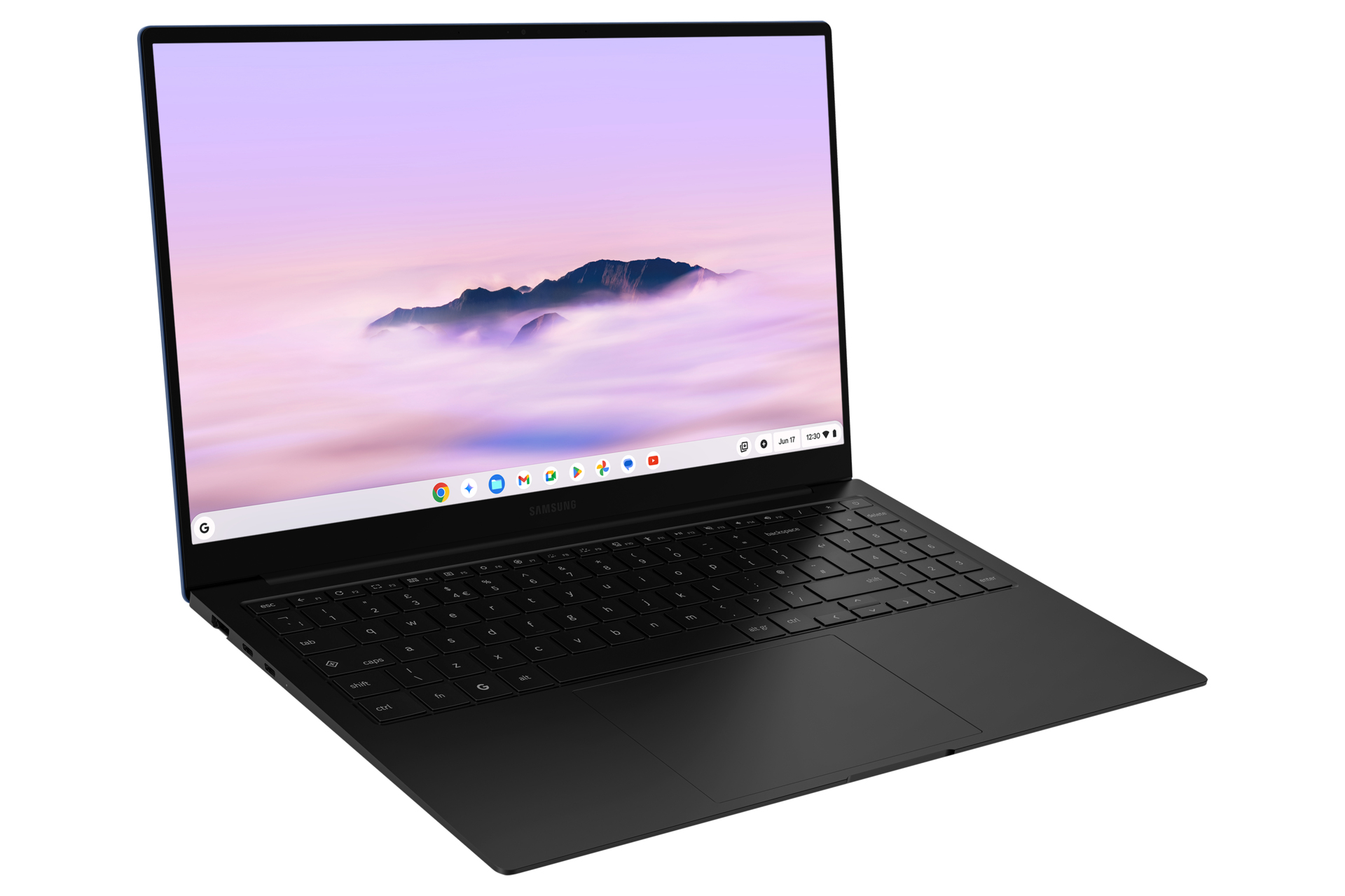 Laptop nero su una superficie bianca, che mostra uno schermo con una scena di montagna.
