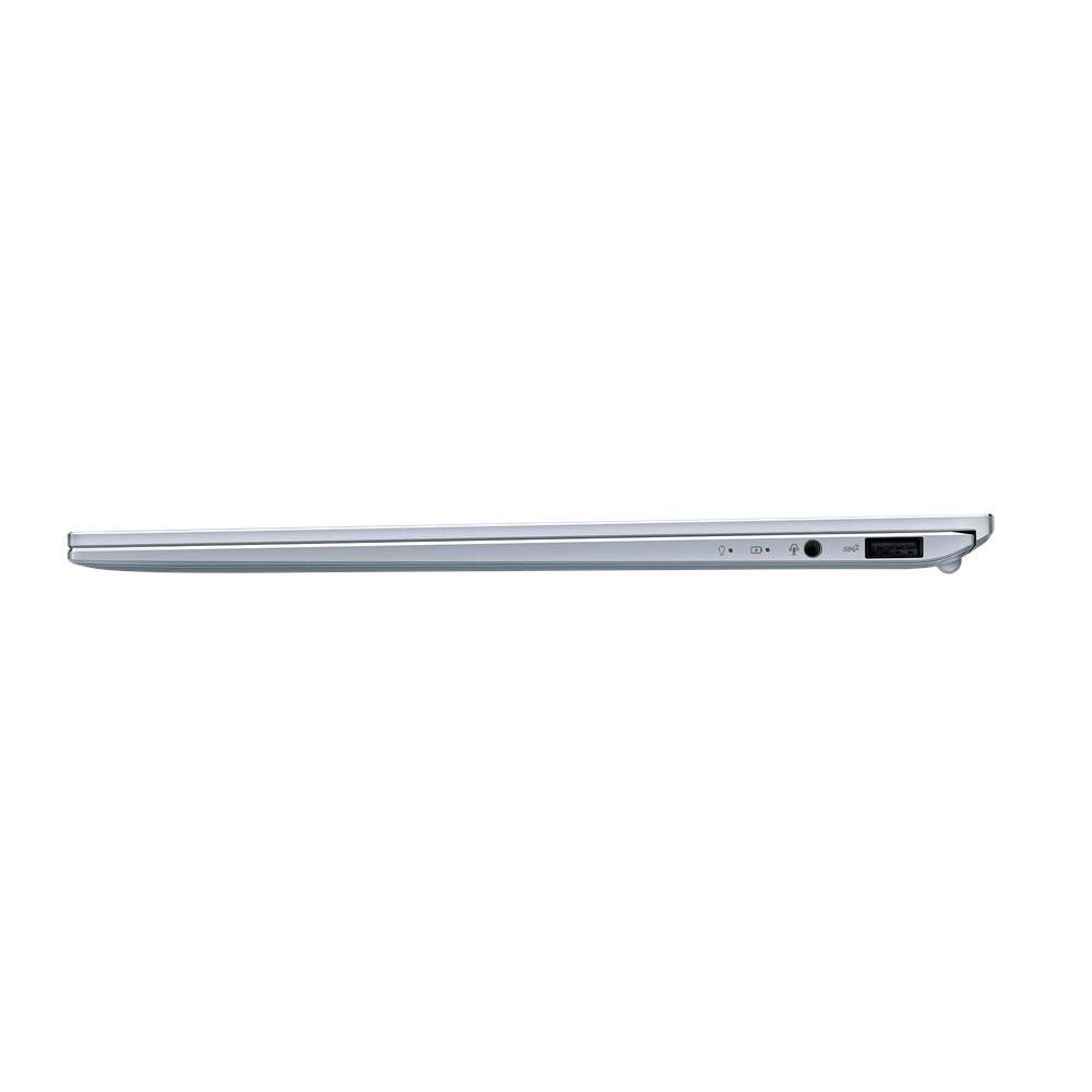 Lato laptop argentato. Porte, prese d'aria e una porta di ricarica sono visibili.