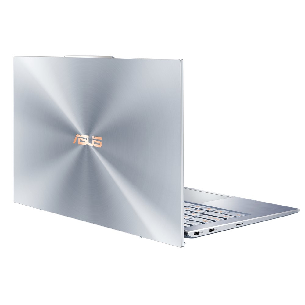 Laptop argentato, vista posteriore, con il logo ASUS e un motivo circolare sul coperchio.
