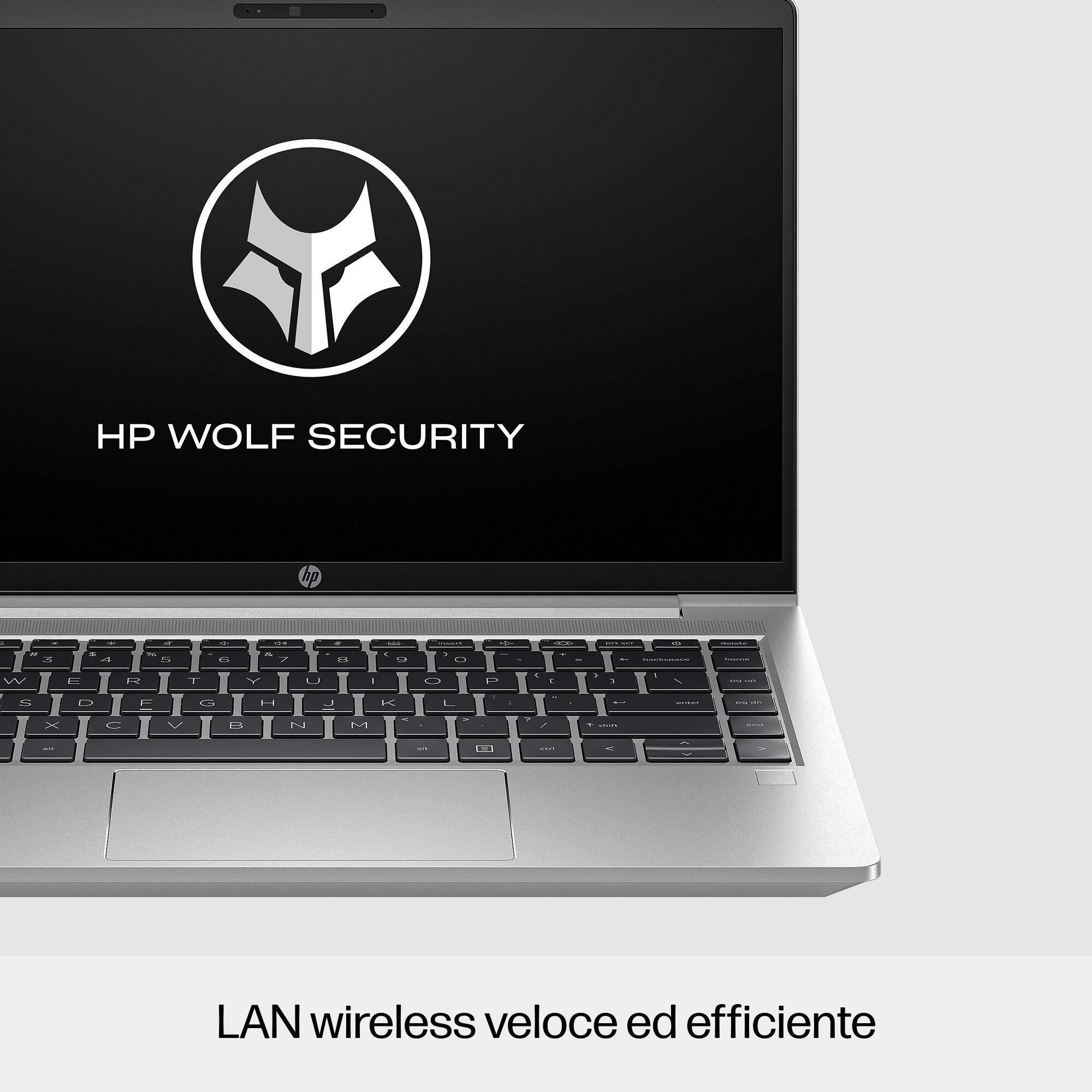 Schermo laptop con logo HP Wolf Security, tastiera sotto.