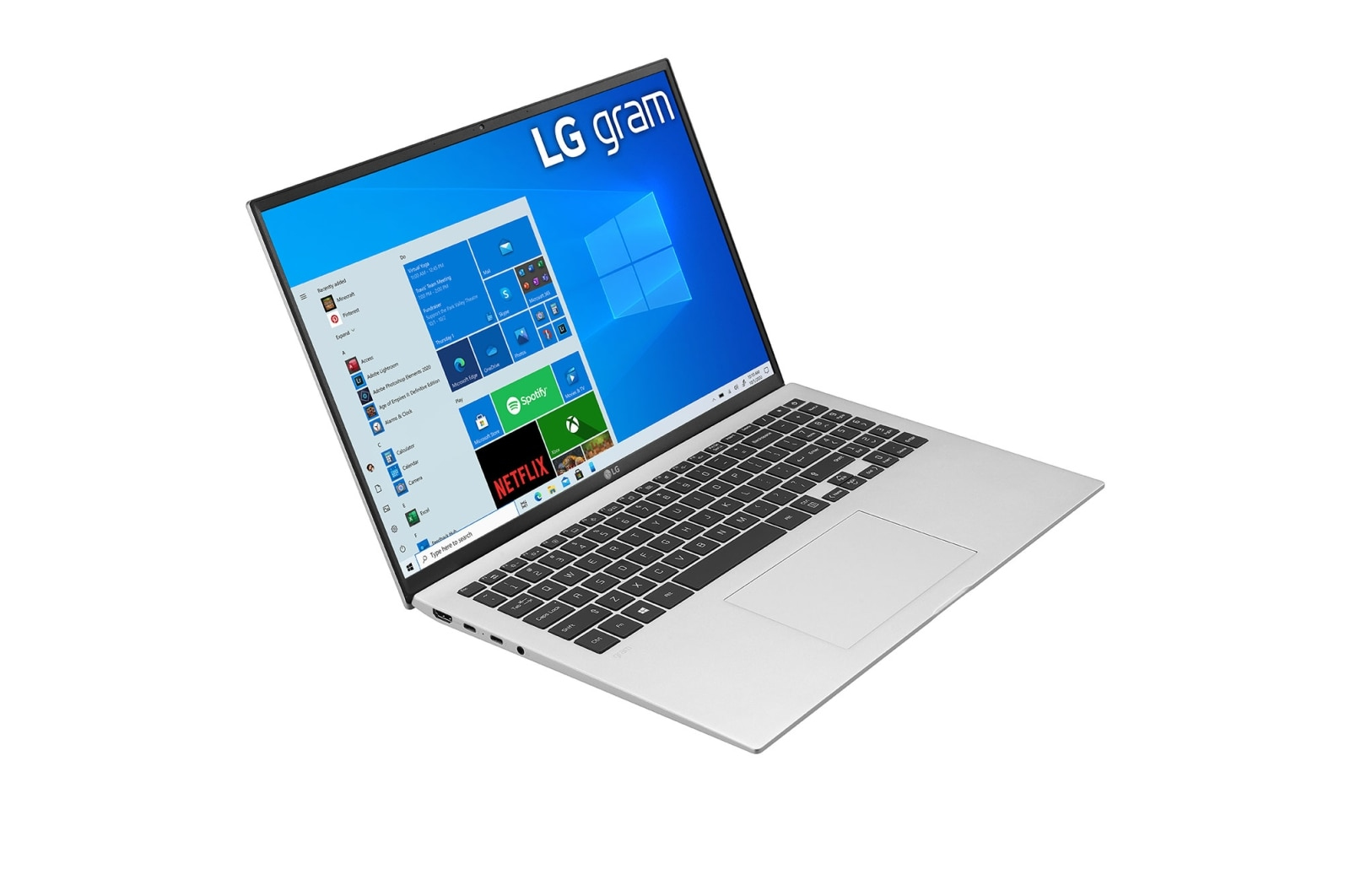 Biały laptop z interfejsem Windows. Widok z boku na białym tle.