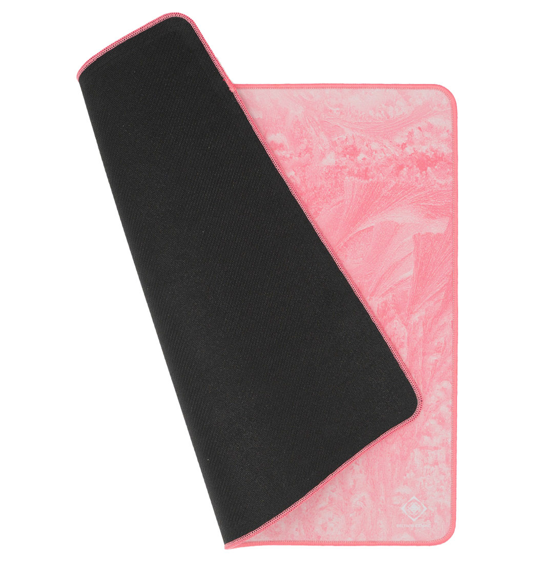 Pink mousepad with black underside. The top has a marble-like pattern and pink stitching.