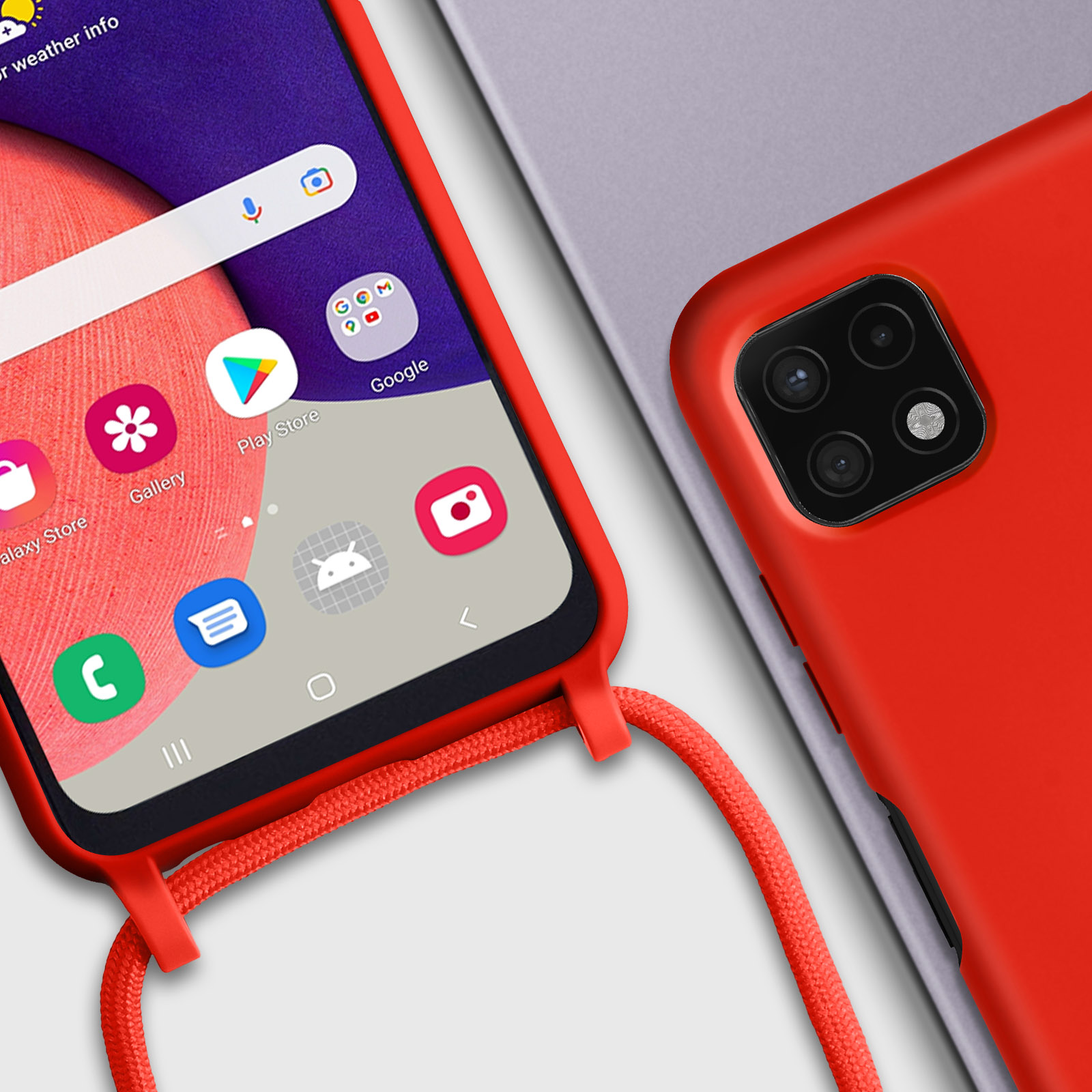 Coque de téléphone rouge avec cordon rouge, sur surface blanche. Gros plan.