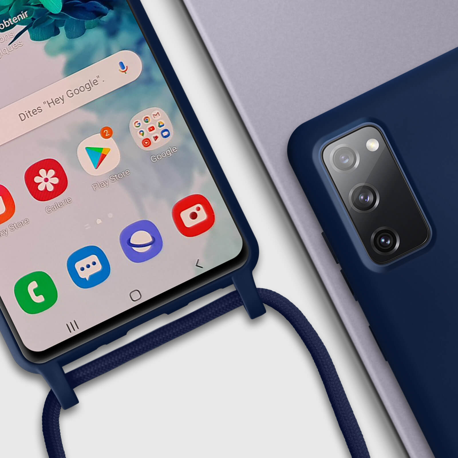 Téléphone bleu avec coque et cordon, écran visible et icône Google. Autre téléphone visible.
