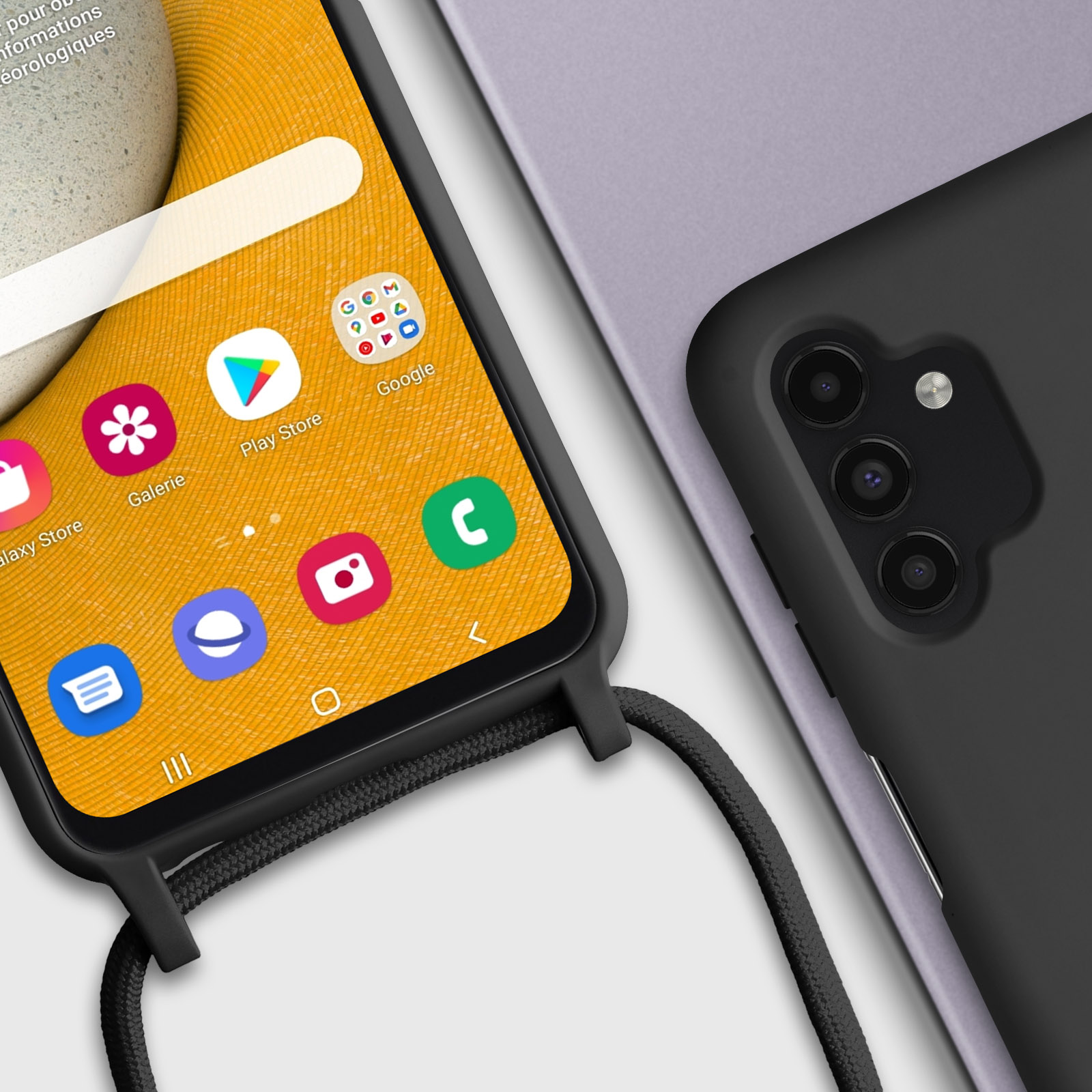 Primo piano di uno schermo del telefono che mostra le icone delle app, con custodia nera e cordino.