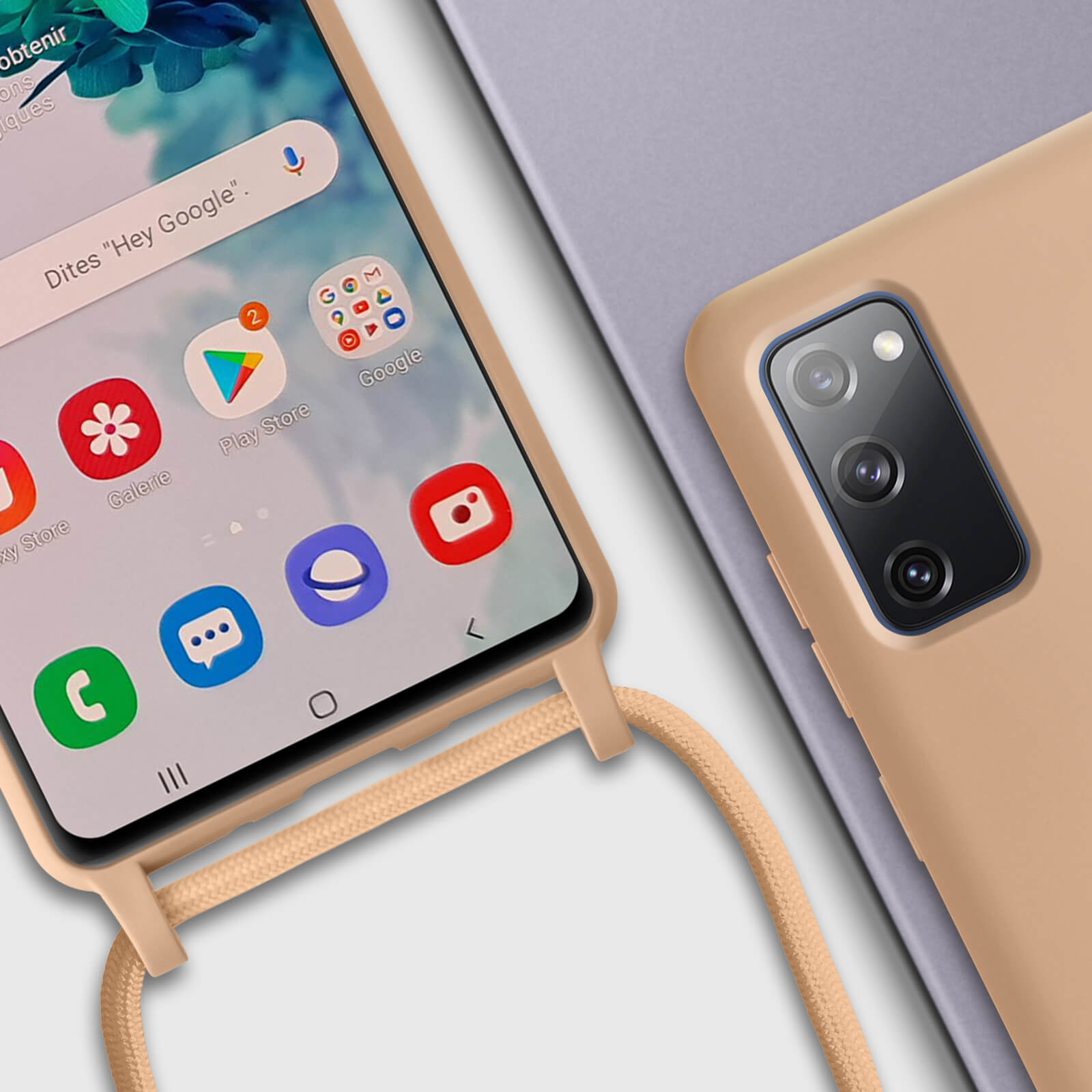 Un telefono con app sullo schermo e una custodia con un cordino beige.