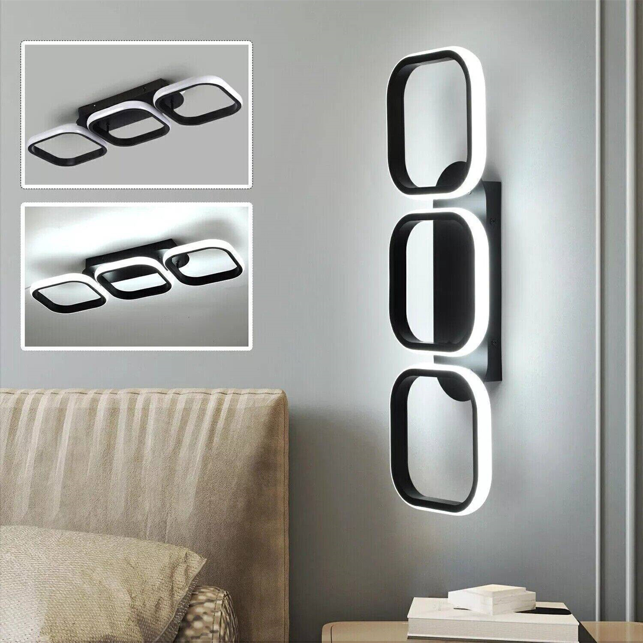 Eine moderne Wandleuchte mit drei beleuchteten rechteckigen Formen, in Schwarz und Weiß, an einer grauen Wand.
