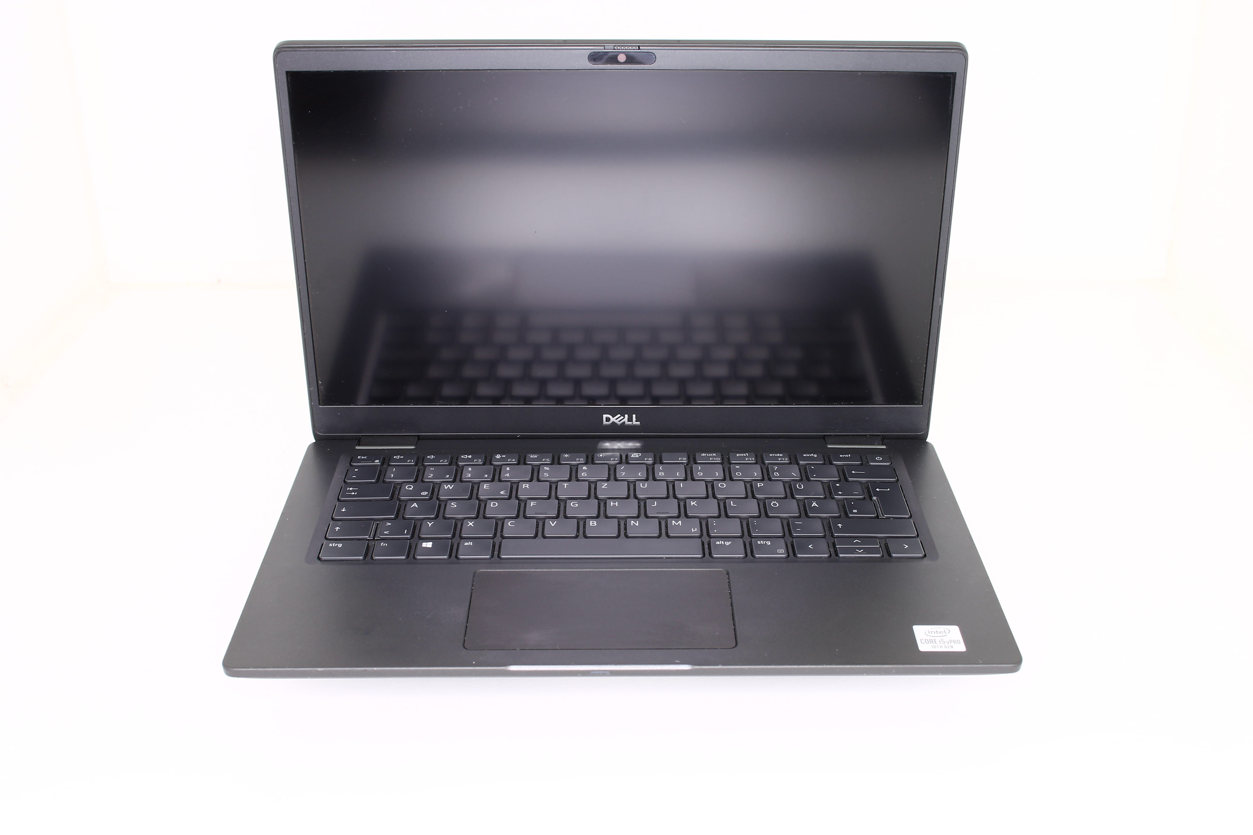 Laptop mit schwarzem Bildschirm und Tastatur. Der Laptop steht auf einer weißen Oberfläche. Das Dell-Logo ist sichtbar.