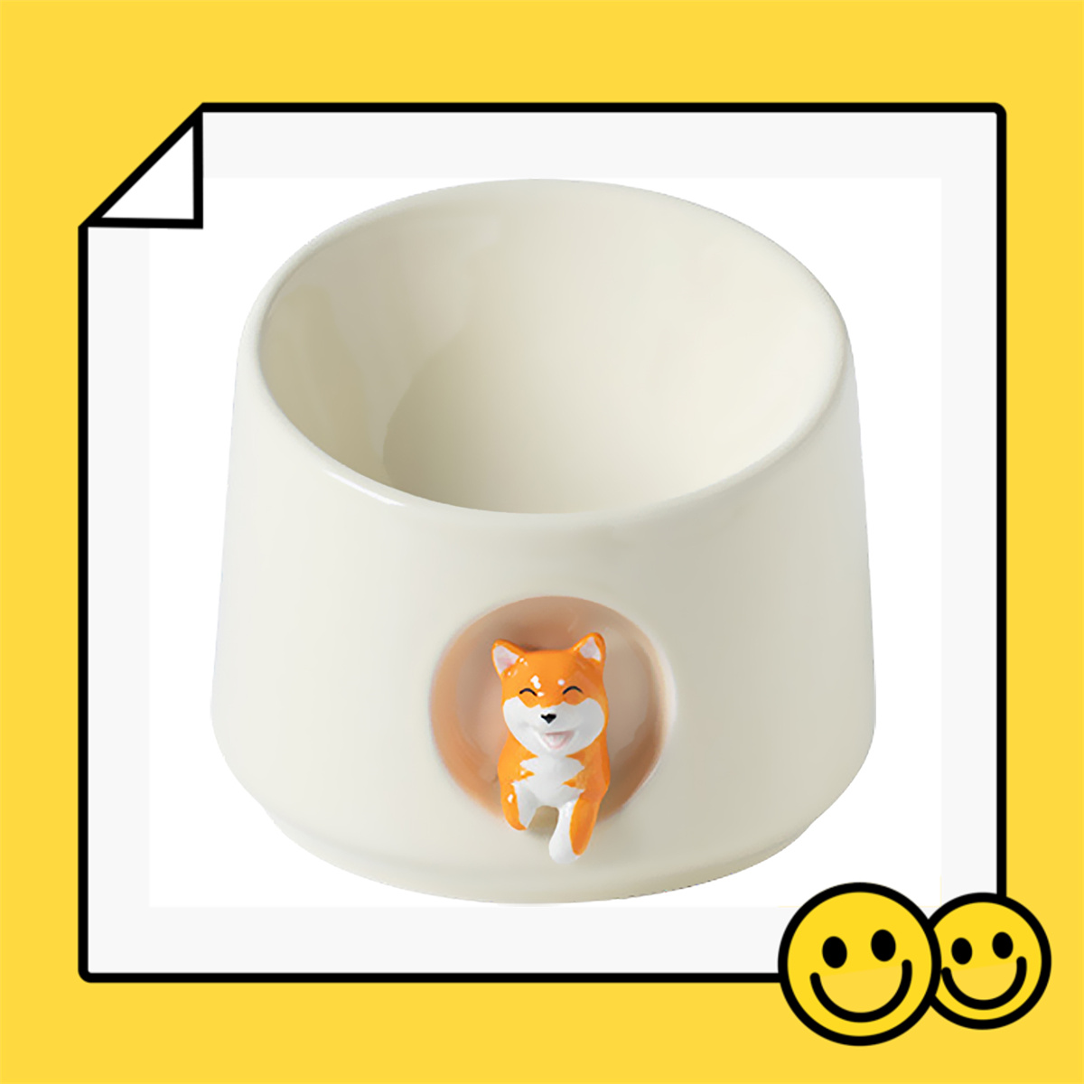 Weißer Napf in Hundeform mit einem Cartoon-Hund darin.