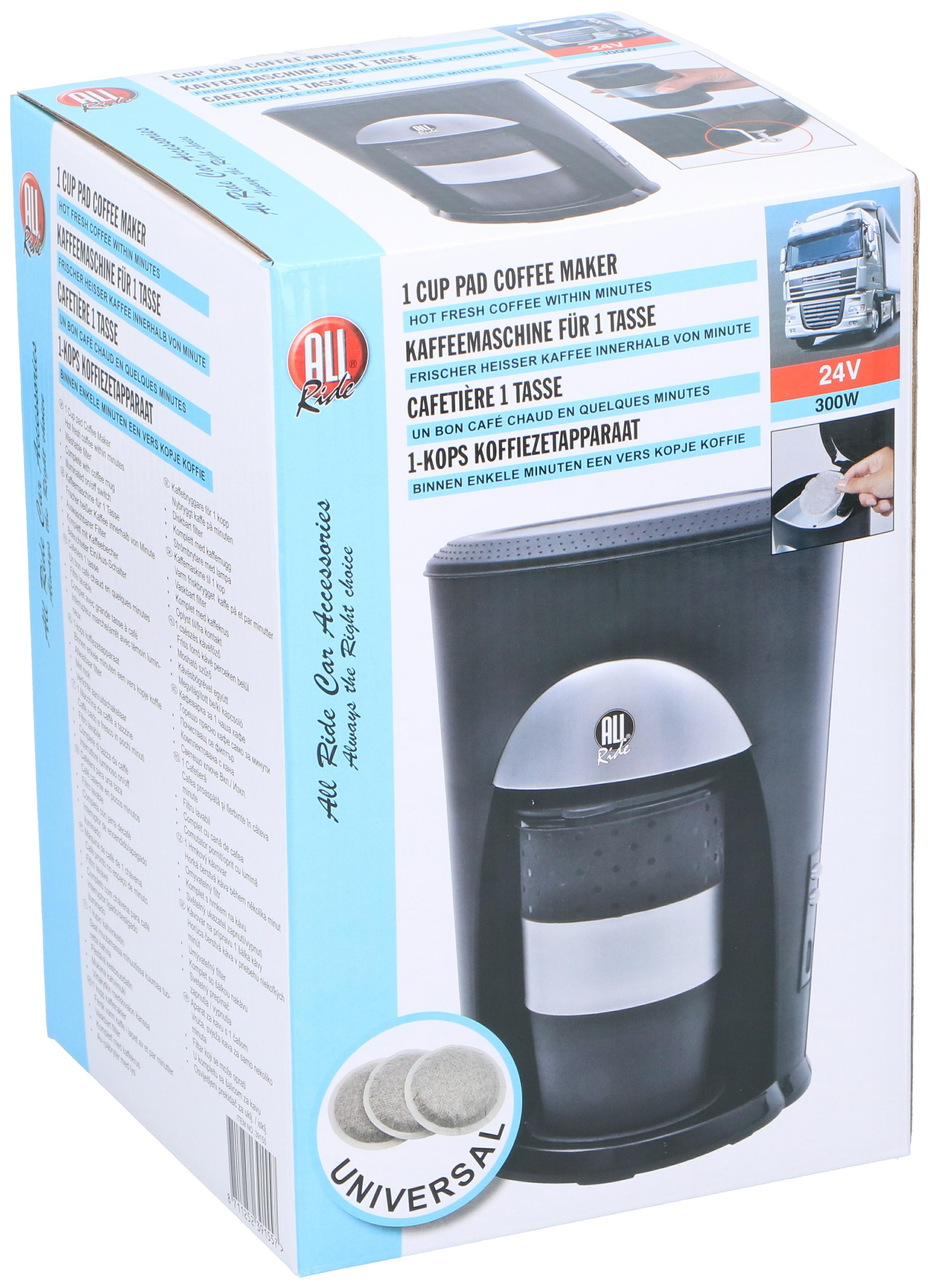 Boxed coffee maker with accessories. Includes a truck image, and text in multiple languages.