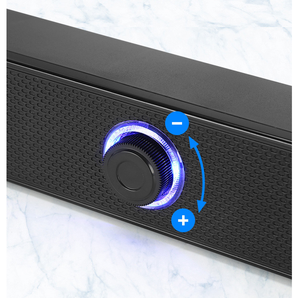 Schwarze Soundbar mit zentralem Bedienknopf, umgeben von blauem Licht und Plus/Minus-Symbolen.