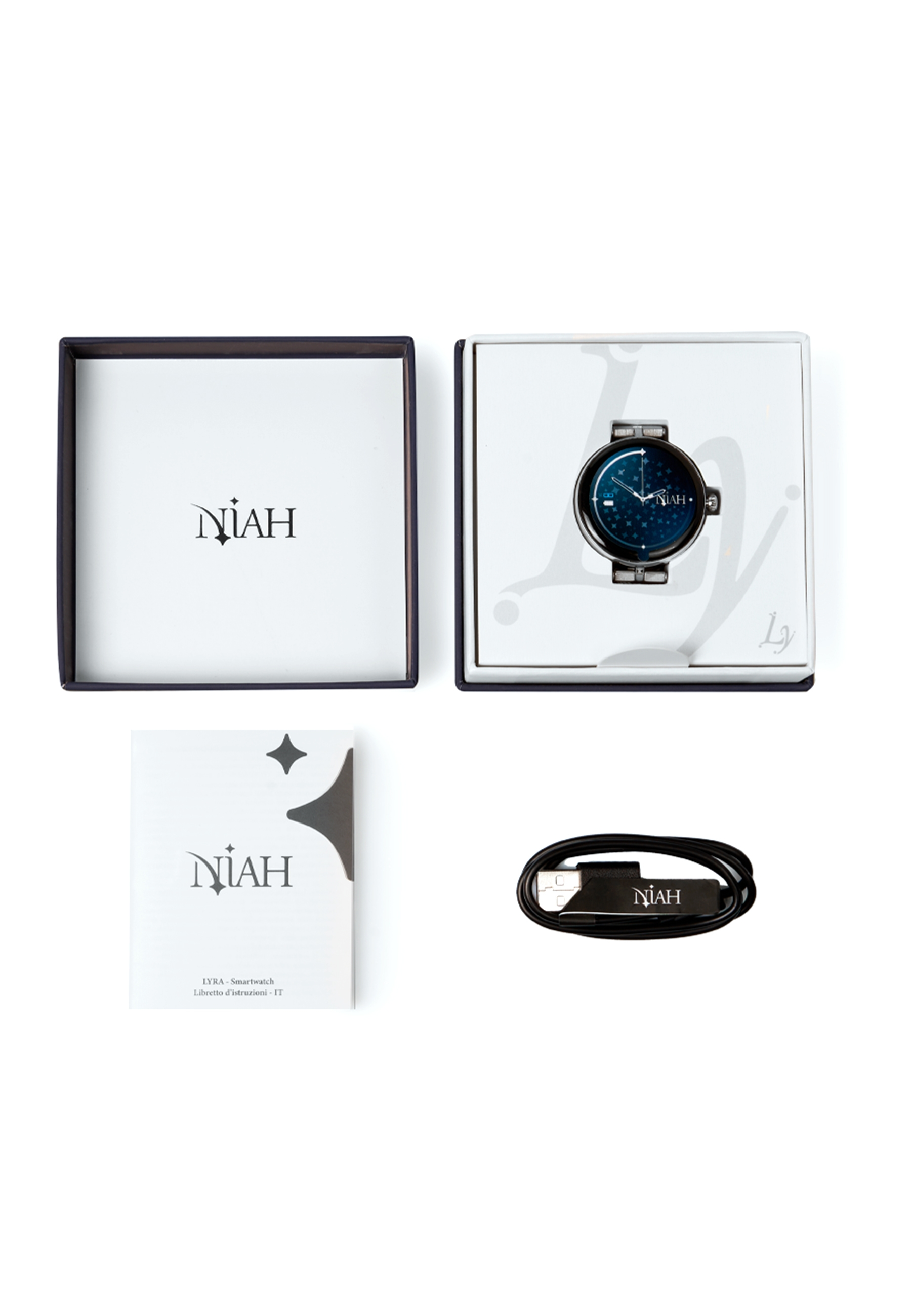 Eine Uhr in einer Schachtel, mit Ladekabel und Benutzerhandbuch. Box und Zubehör auf weißer Oberfläche.