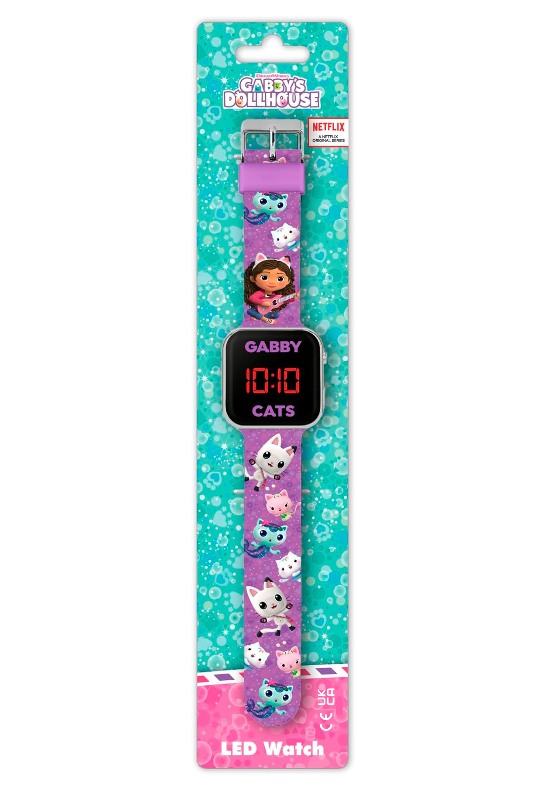 Montre LED violette Gabby's Dollhouse sur emballage. Gabby, 10h10, et chats.