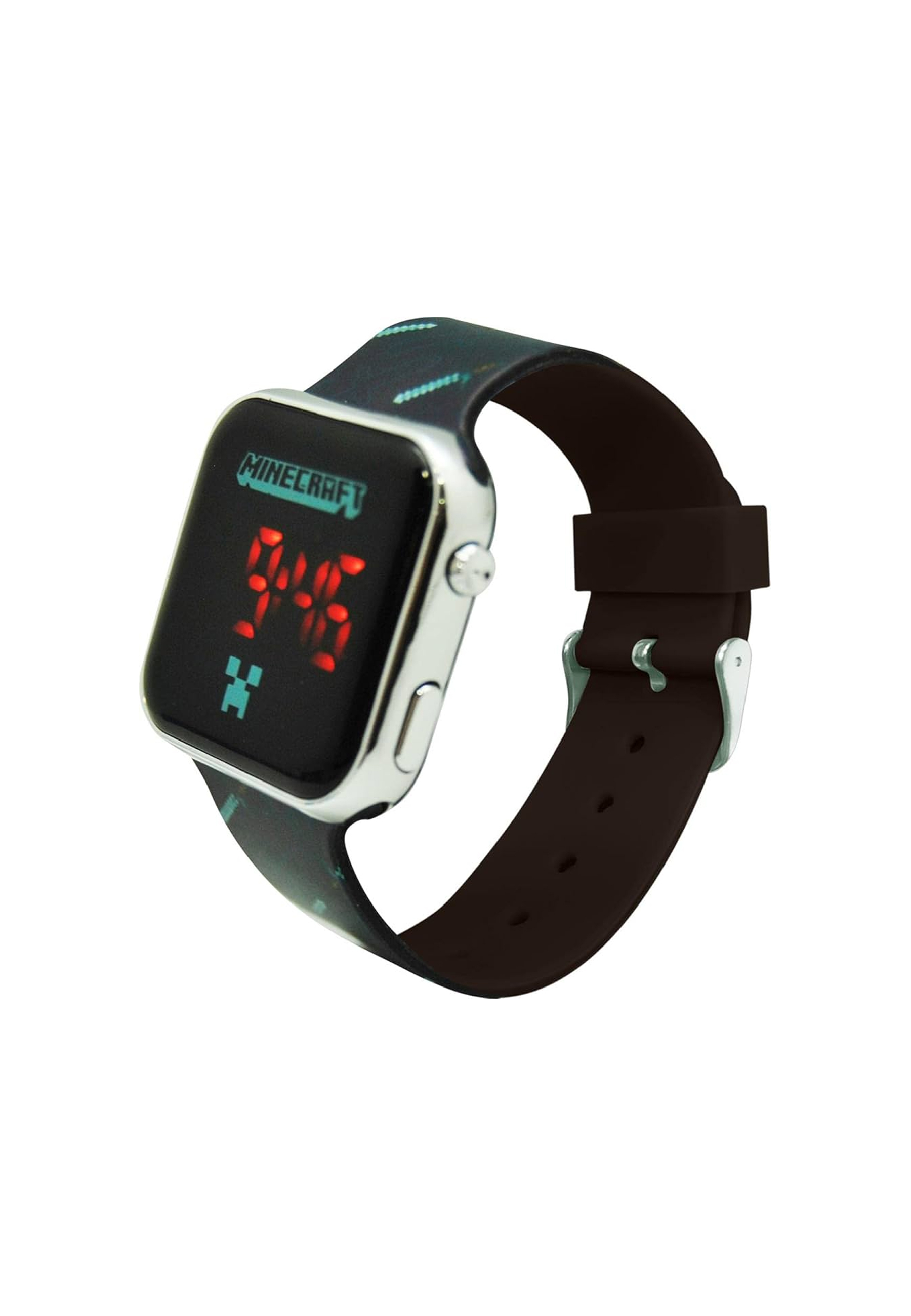Montre numérique Minecraft. Bracelet noir, cadran carré. Heure affichée : 9:46. Logo pixelisé vert.