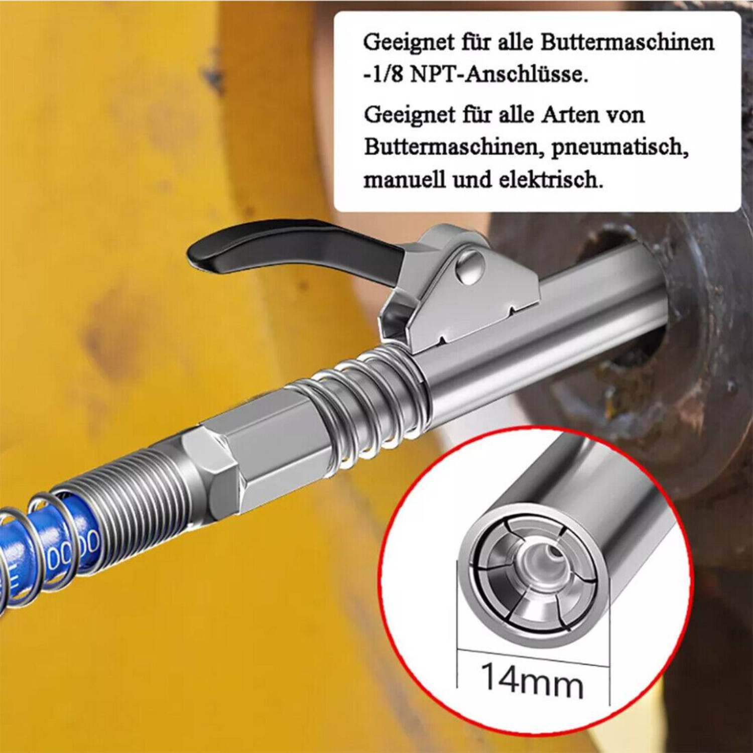 Eine silberne Fettpresse mit Text und Detailaufnahme, platziert auf einer gelben Oberfläche.
