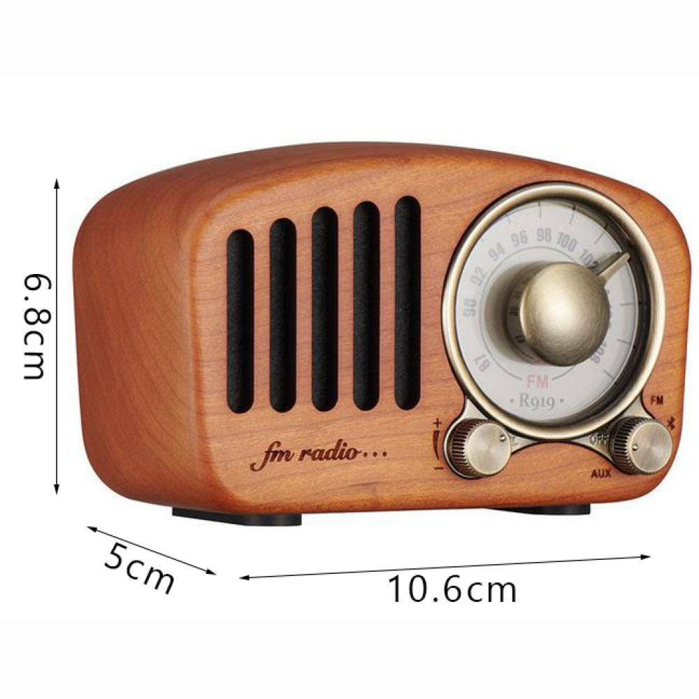 Holz-Retro-Radio mit Zifferblatt, Lautsprecher und Abmessungen in Zentimetern, mit Knöpfen.