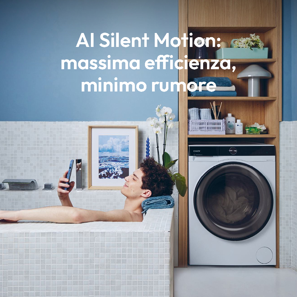 Mężczyzna w wannie korzystający z telefonu, w łazience. W pobliżu jest pralka.