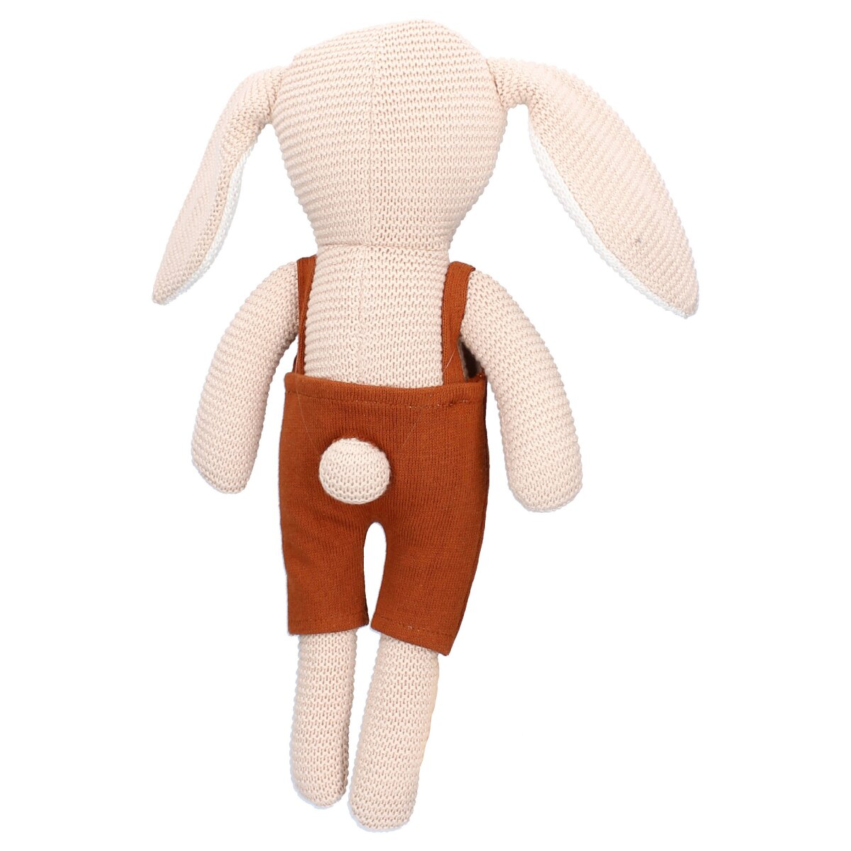 Ein Spielzeugkaninchen wird von hinten gezeigt. Es ist hellbeige mit braunen Latzhosen und einem weißen Schwanz.
