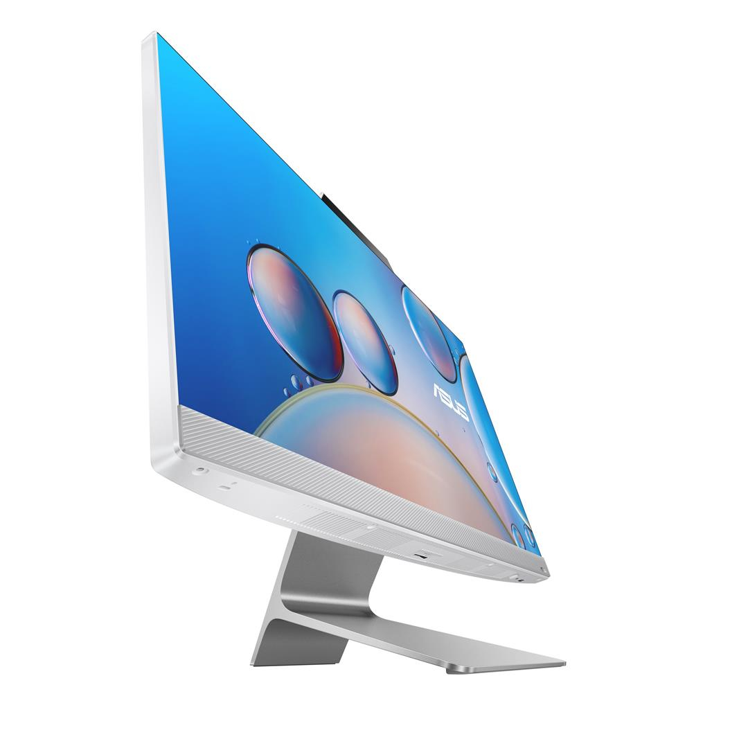 Biało-srebrny monitor, widok z boku, z jasnoniebieskim ekranem. Białe tło.