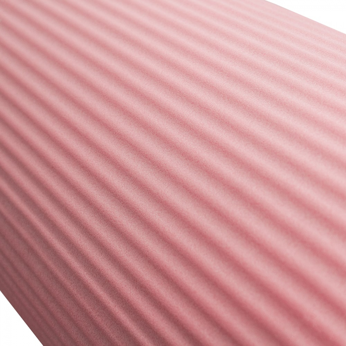 Close up of a pink ribbed yoga mat rolled up.