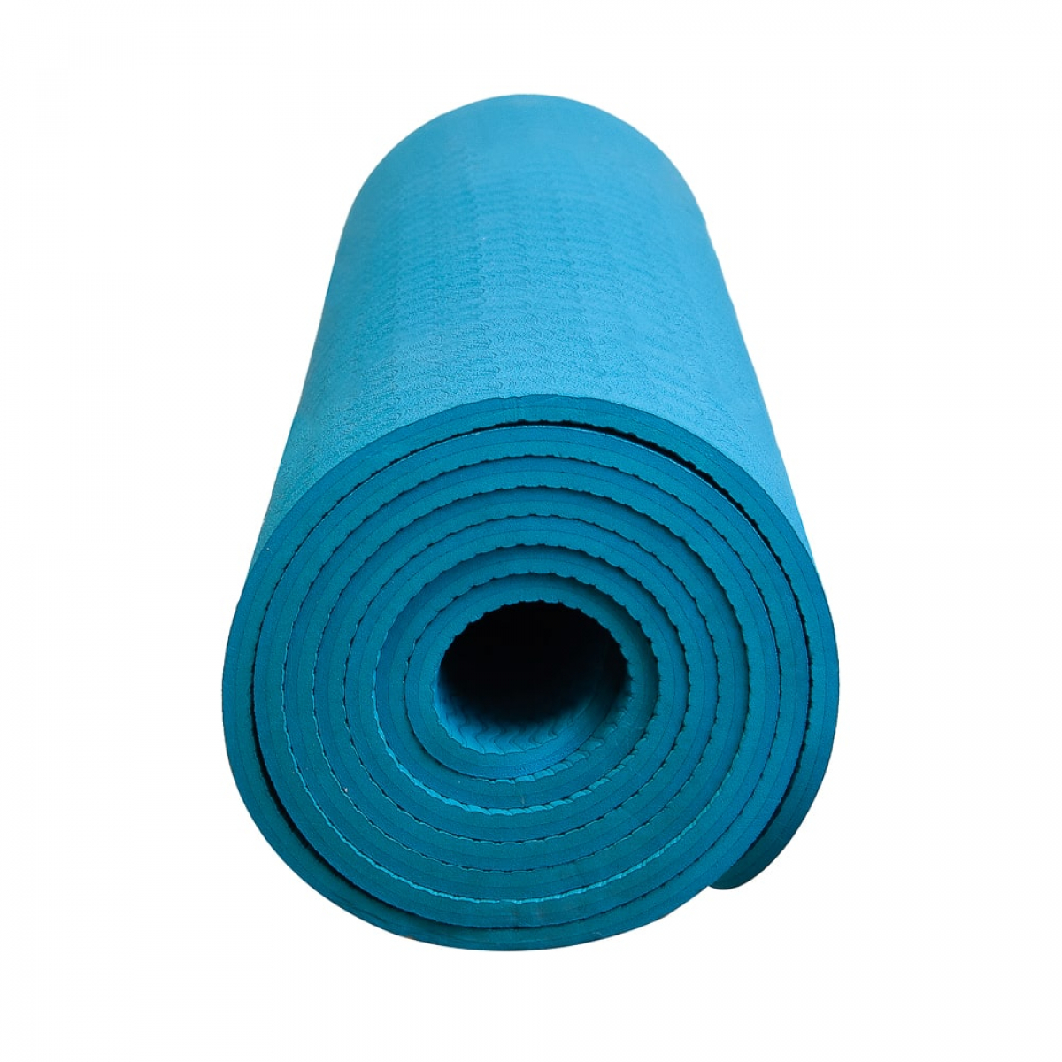 Rolled-up blue yoga mat on a white backdrop. Shows the rolled layers.