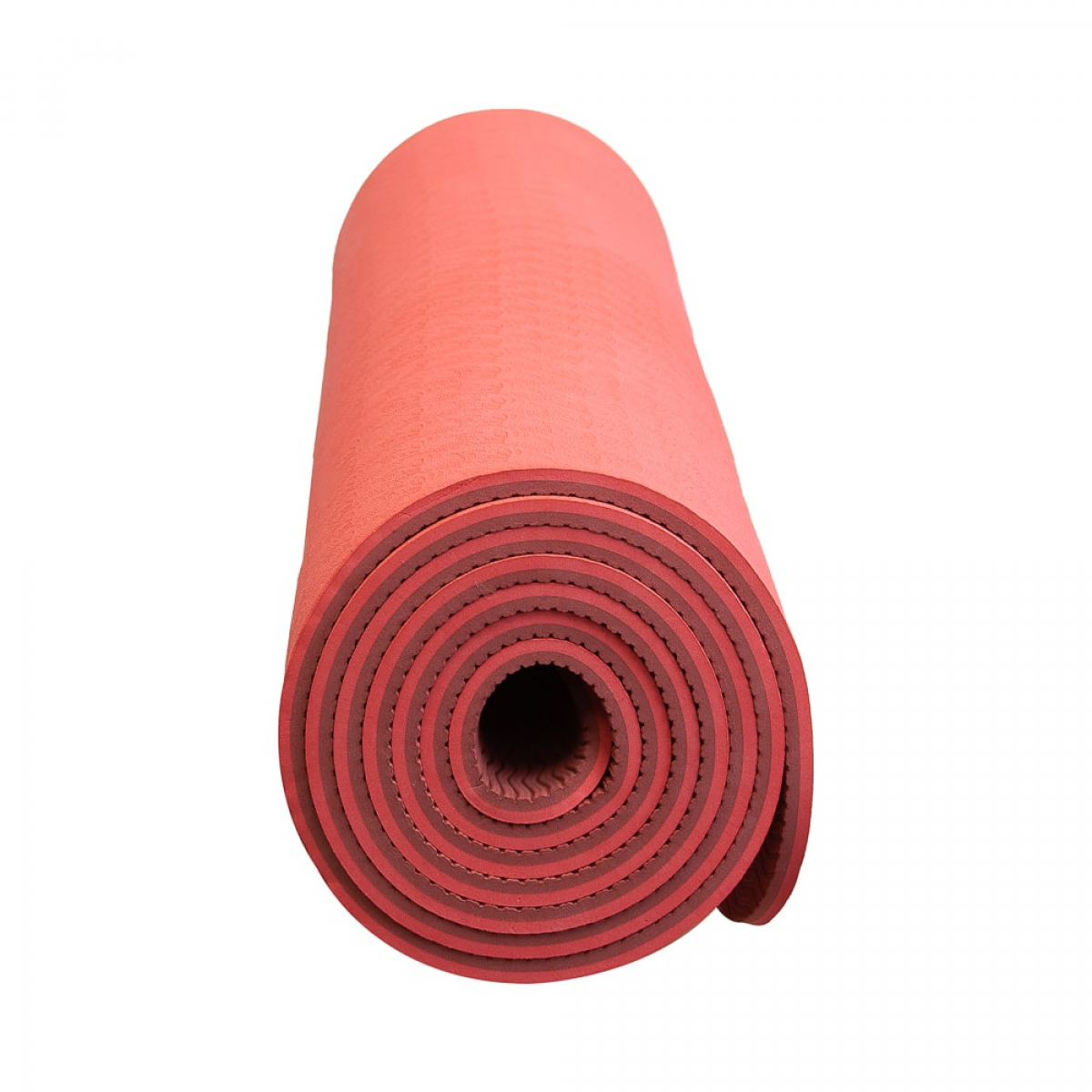 Rolled up red yoga mat. Dark red interior. White background.