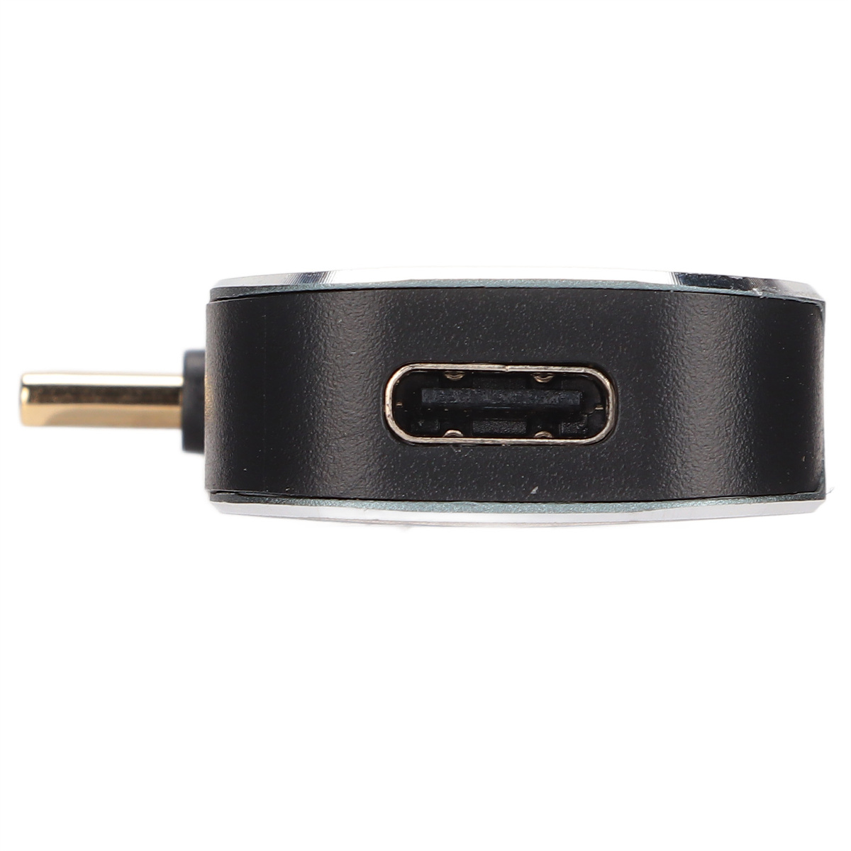 Schwarz-silberner USB-C-Anschluss. Es ist ein kleines, abgerundetes Objekt.