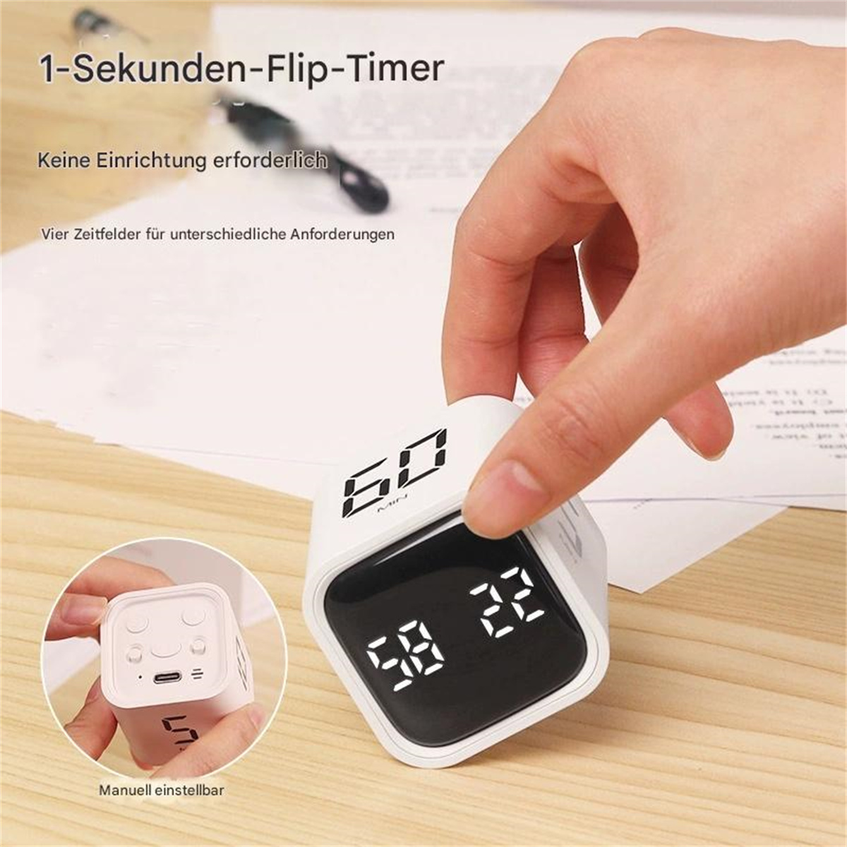 Weißer Würfel-Timer mit digitaler Anzeige. Eine Hand hält ihn. Andere Würfel und Text sind ebenfalls sichtbar.