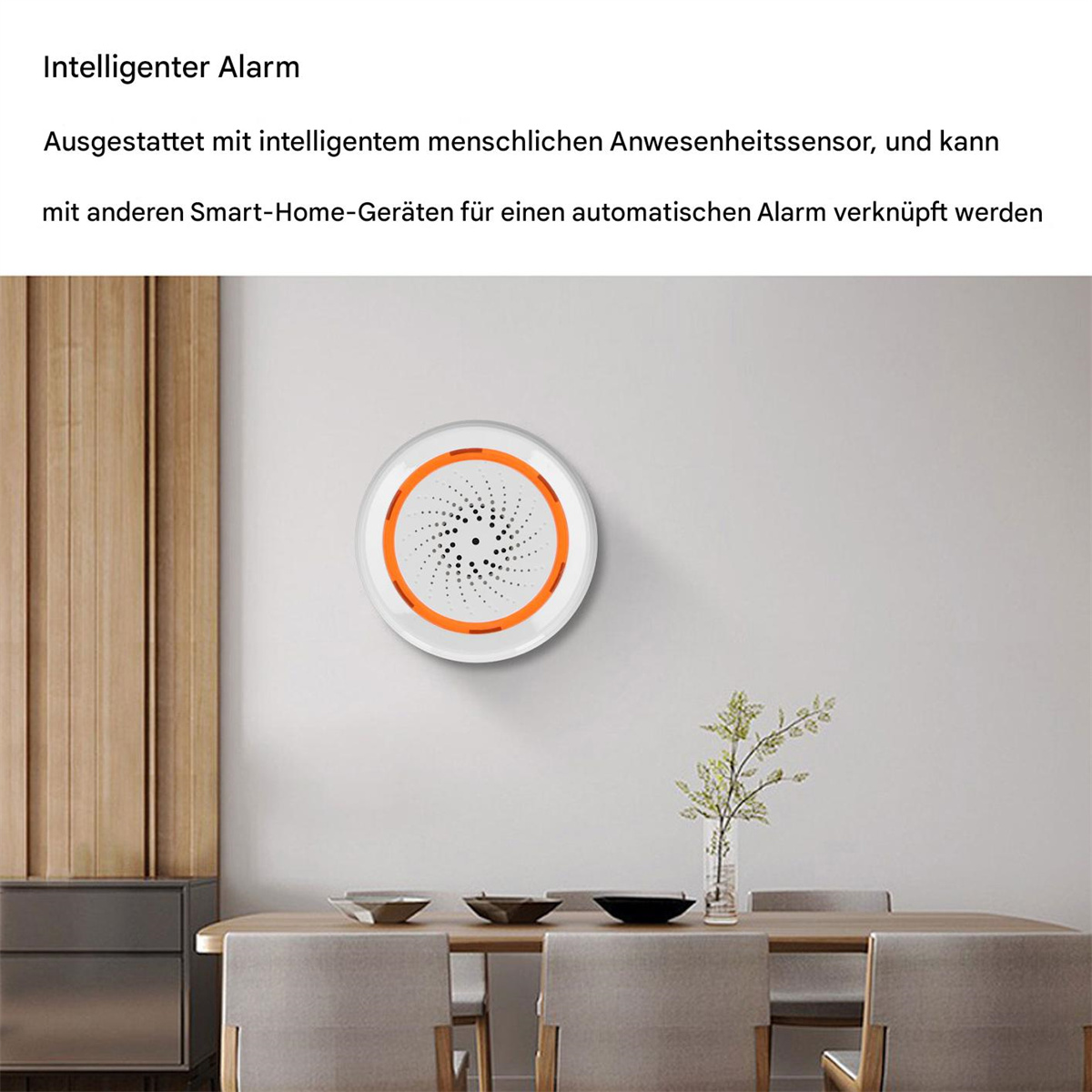 Ein kreisförmiges, weißes Smart-Home-Alarmsystem, das an einer weißen Wand über einem Tisch befestigt ist.