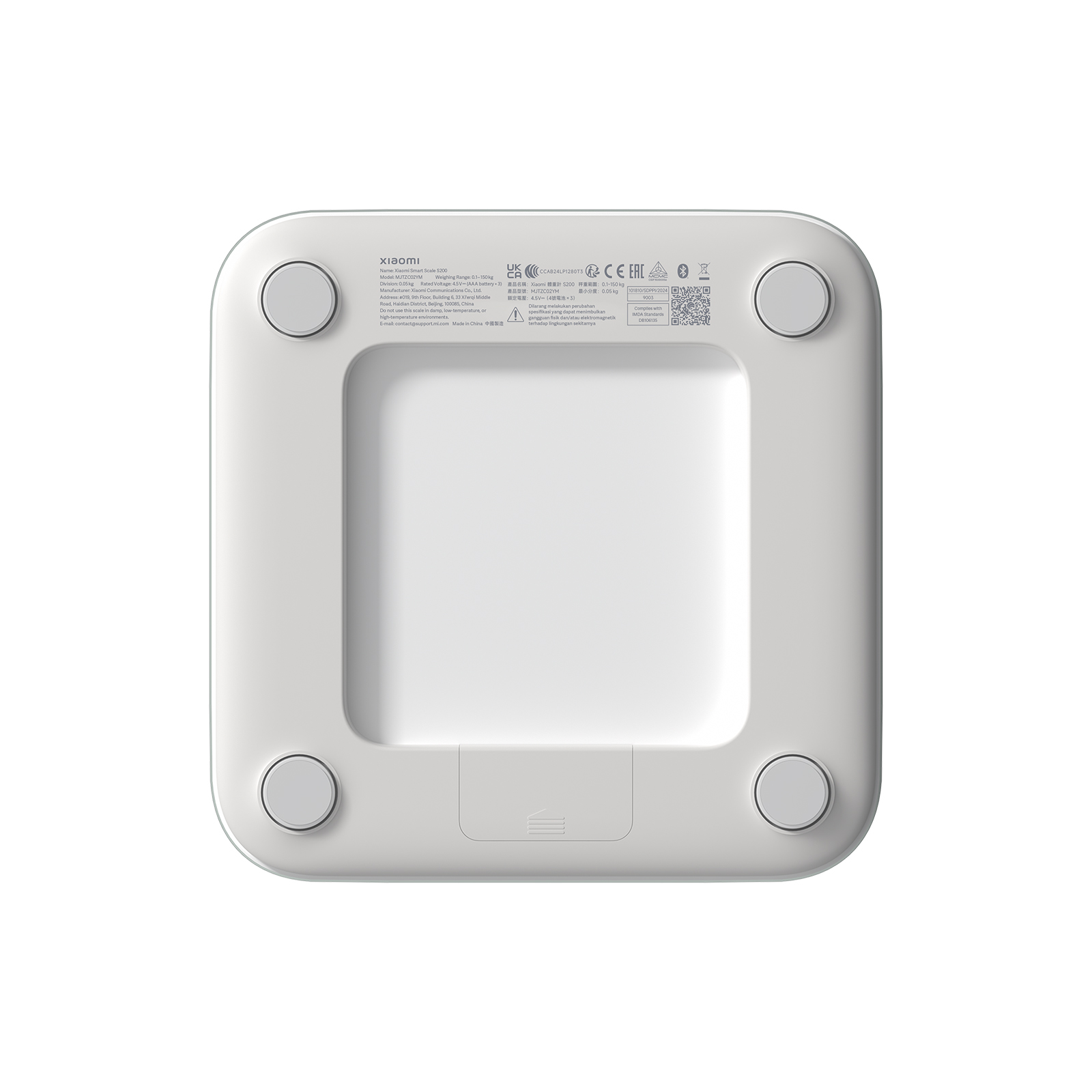 Biała kwadratowa waga z czterema szarymi kołami. Tył urządzenia z nazwą marki i tekstem.