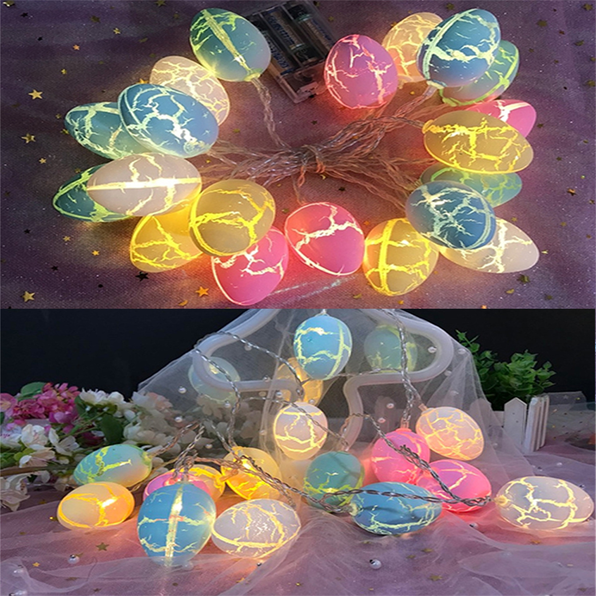 Lichterketten mit eiförmigen Lichtern in mehreren Farben. Sie sind beleuchtet und auf einer Schnur angeordnet.