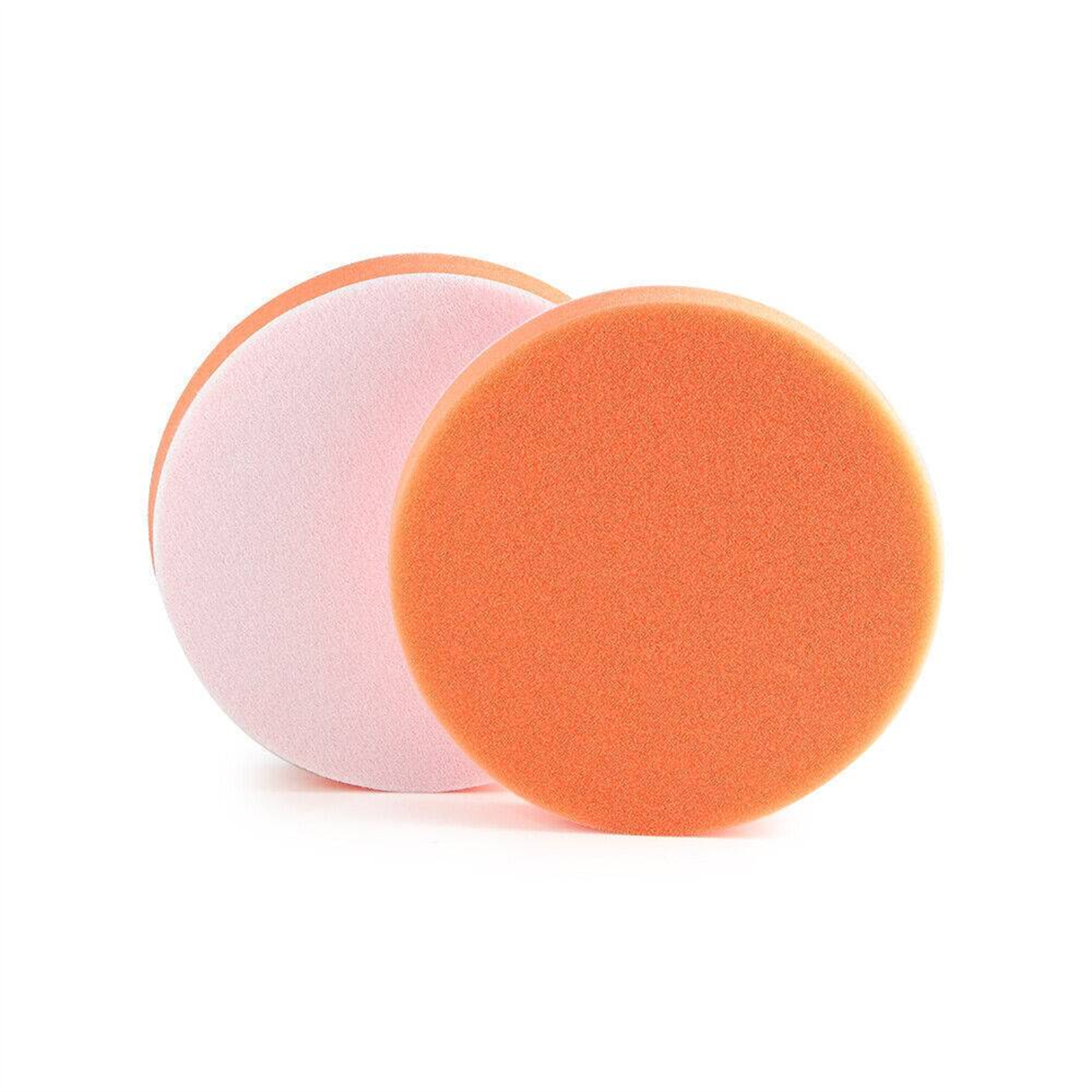 Zwei orange und rosa Schaumstoffpads, möglicherweise zum Polieren, auf weißem Hintergrund.