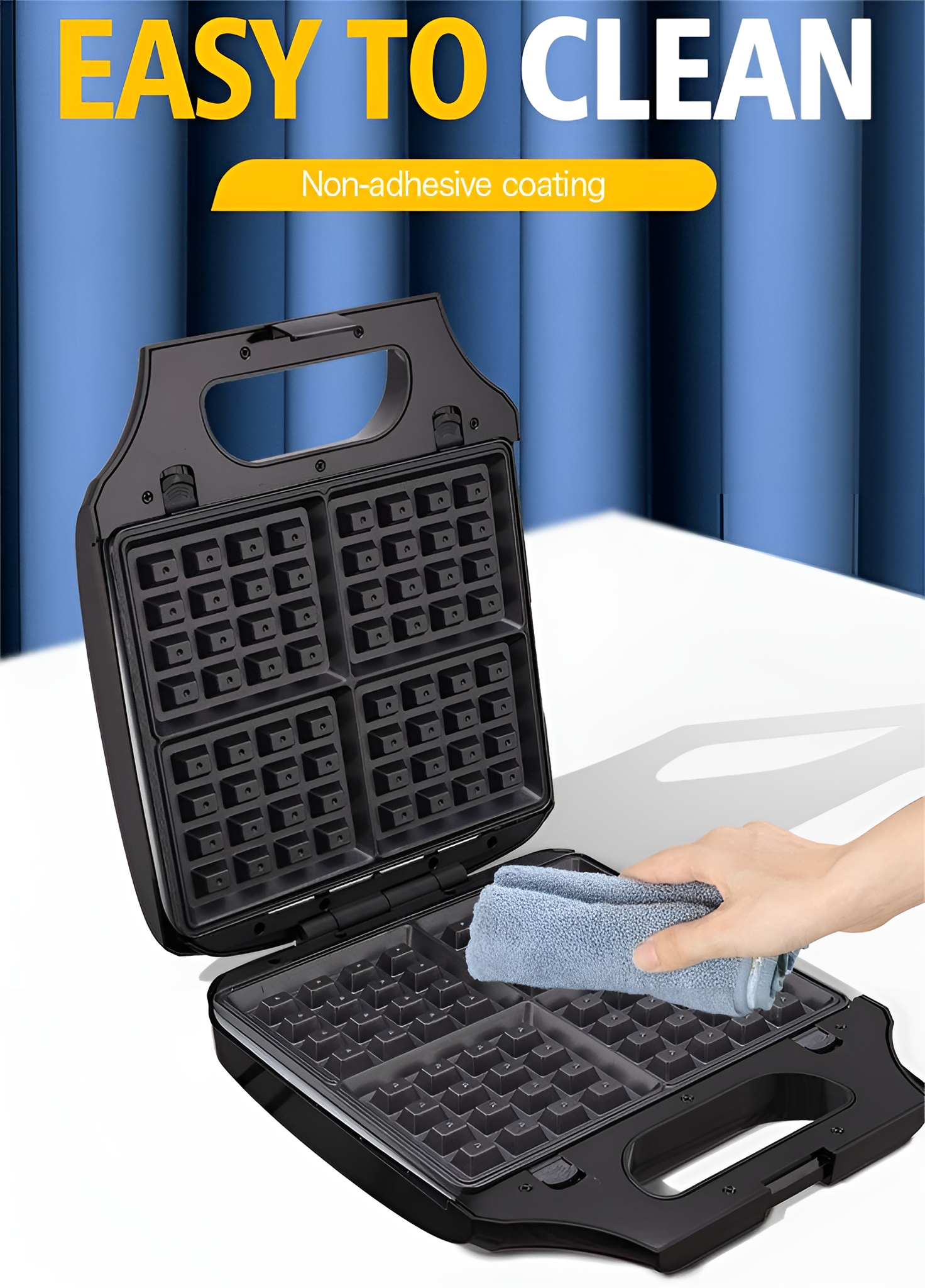 Schwarzer Waffeleisen wird mit einem blauen Tuch gereinigt.