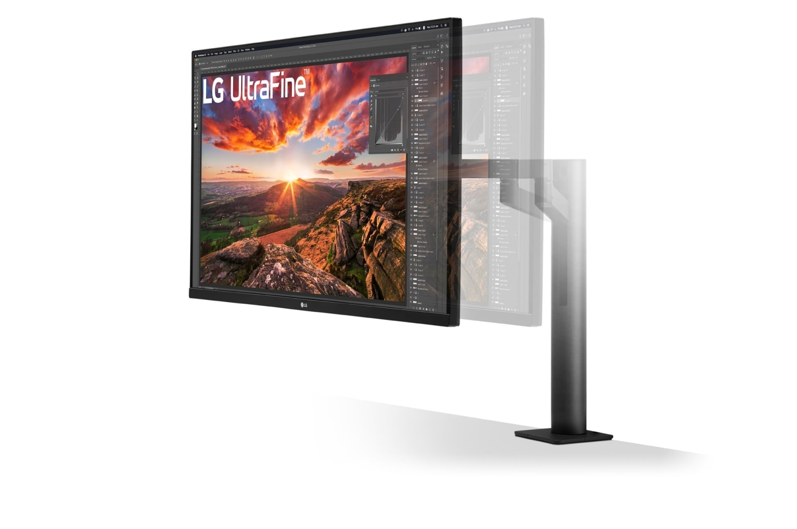 Monitor LG UltraFine na regulowanym stojaku, wyświetlający obraz zachodu słońca.