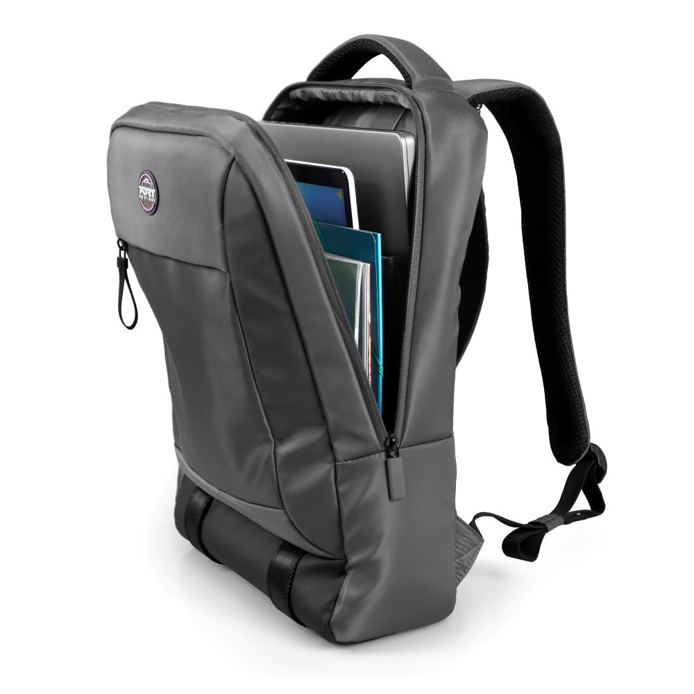 Zaino grigio scuro con laptop, tablet e quaderni all'interno, parzialmente aperto.