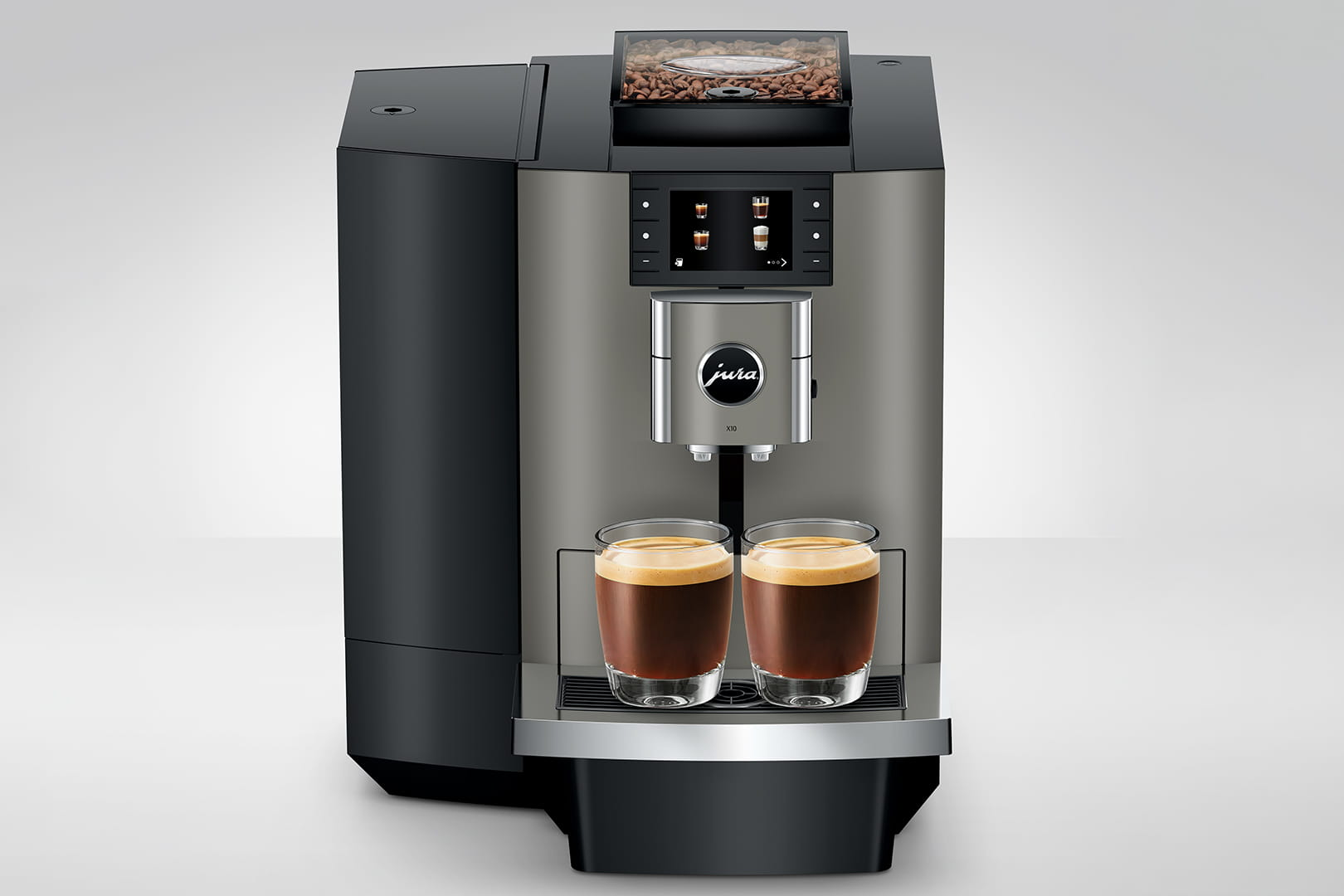 Silber-schwarze Jura-Kaffeemaschine mit zwei Kaffeegläsern.