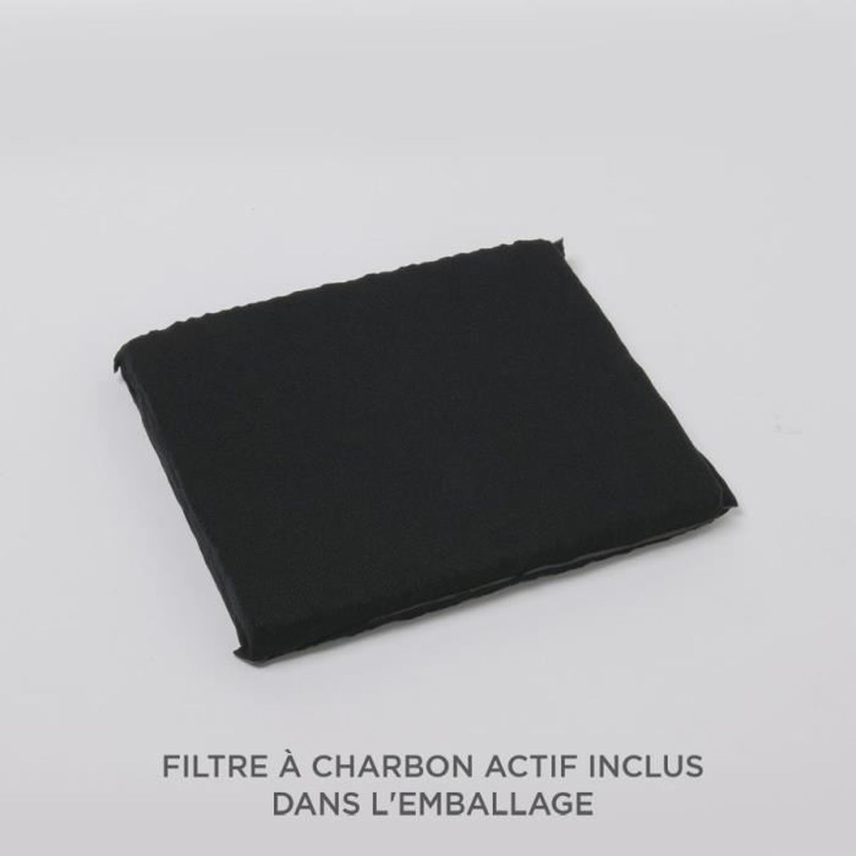 Filtro de carbón activo negro en embalaje. El texto 'FILTRE À CHARBON ACTIF INCLUS' es visible.