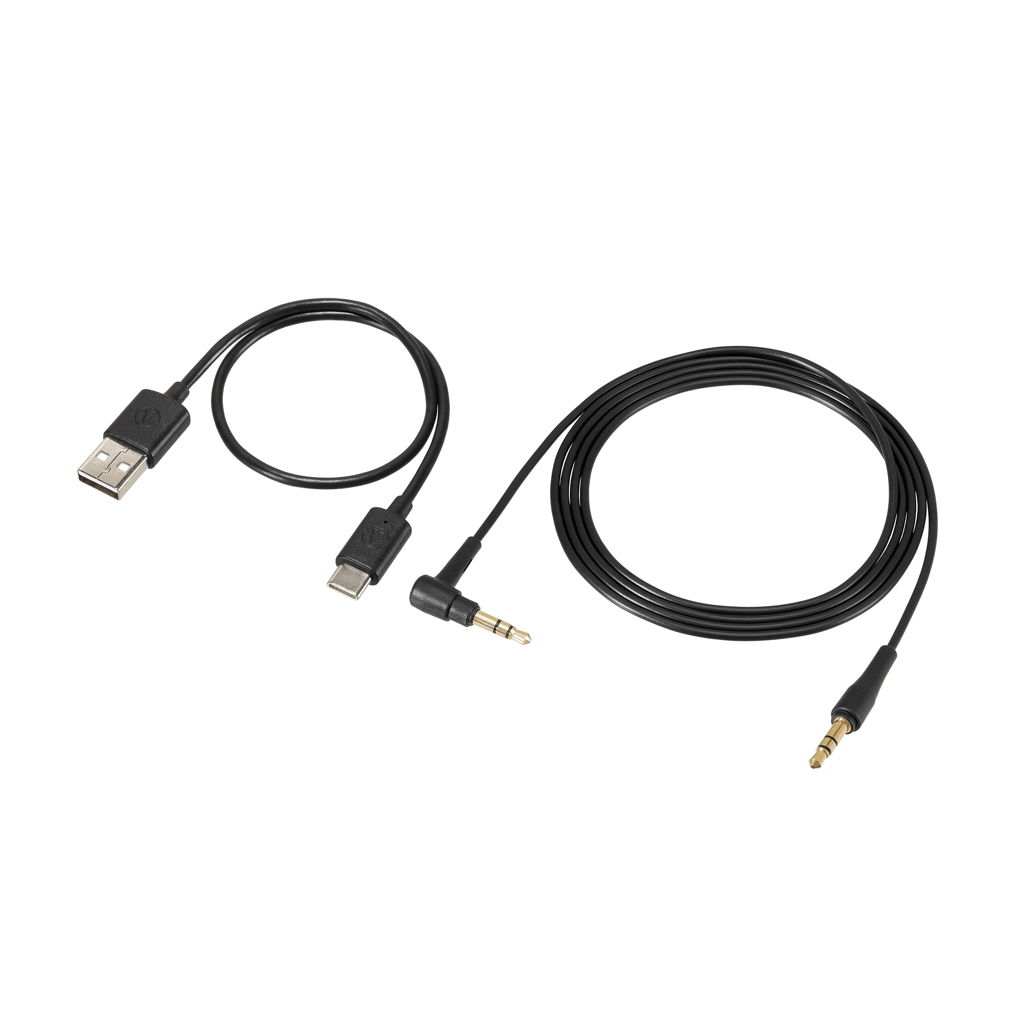 Dwa czarne kable, jeden USB do USB-C, drugi jack 3,5 mm do jack 3,5 mm, na białym tle.