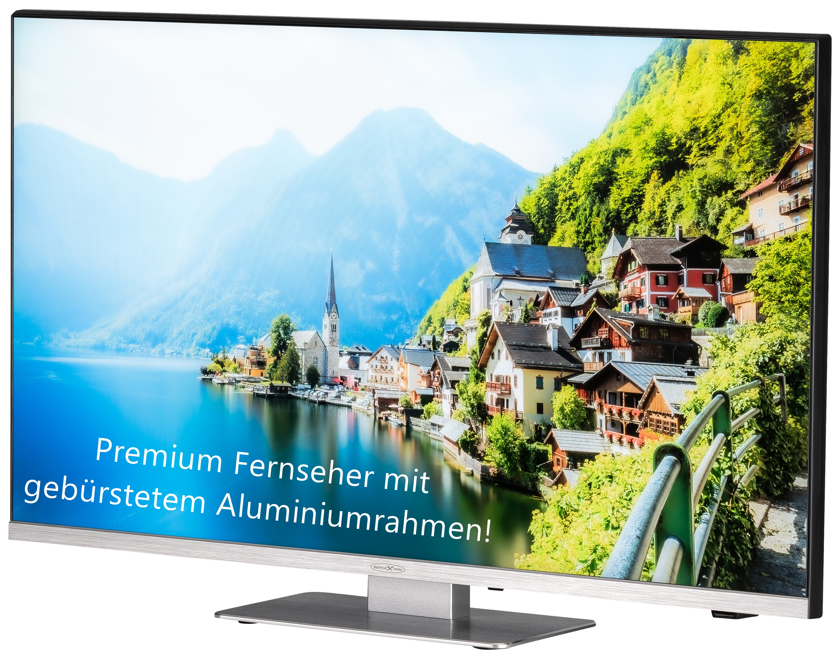 Telewizor ze srebrną ramą wyświetlający malowniczy widok na jezioro z domami i górami.