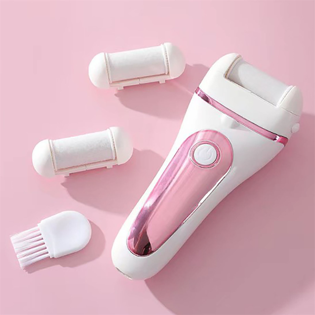 Weißes Fußpflegegerät mit rosa Akzenten und Zubehör auf rosa Oberfläche.
