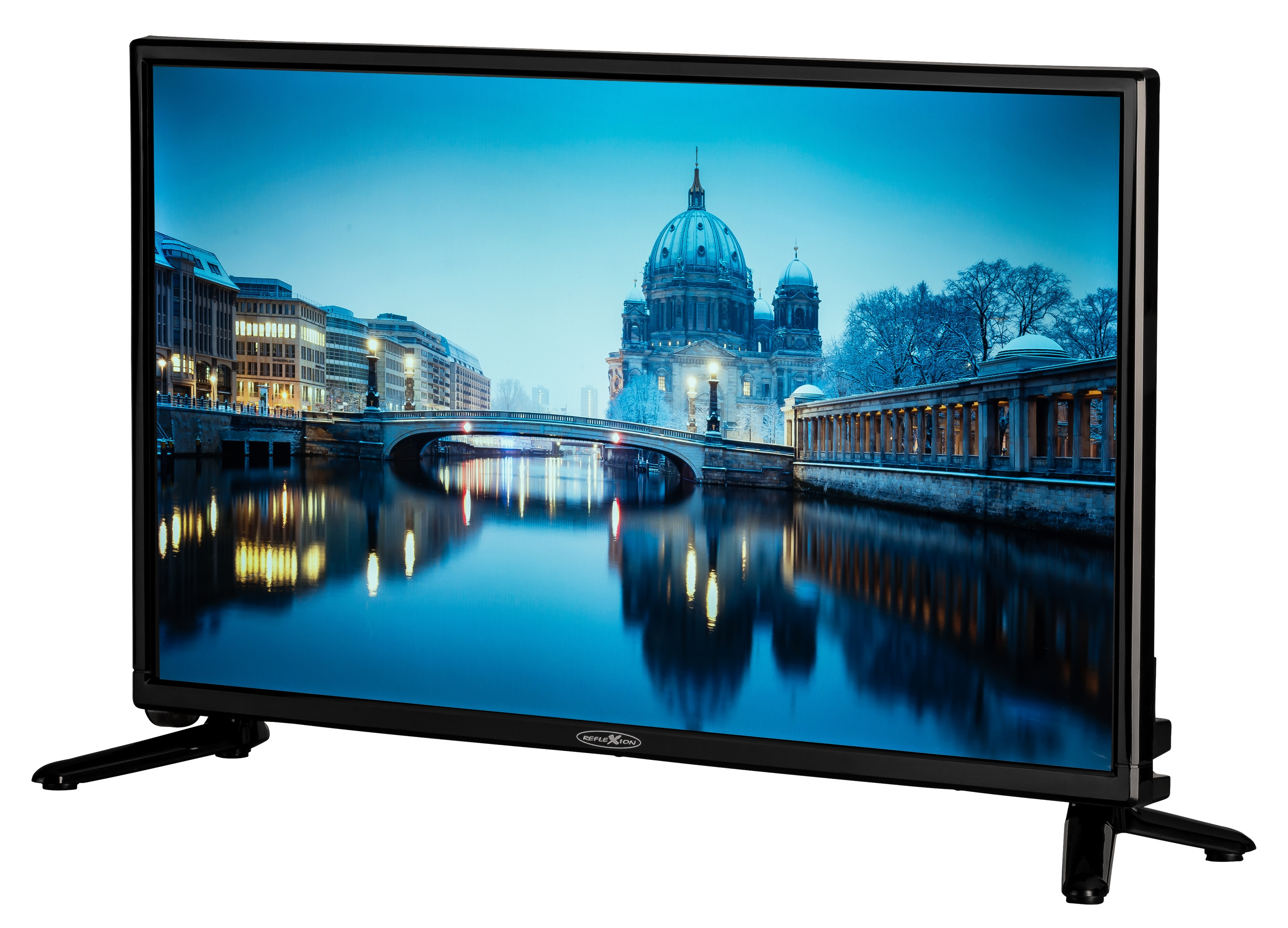 Telewizor wyświetlający zimowy krajobraz miejski nad wodą z mostem i budynkami.
