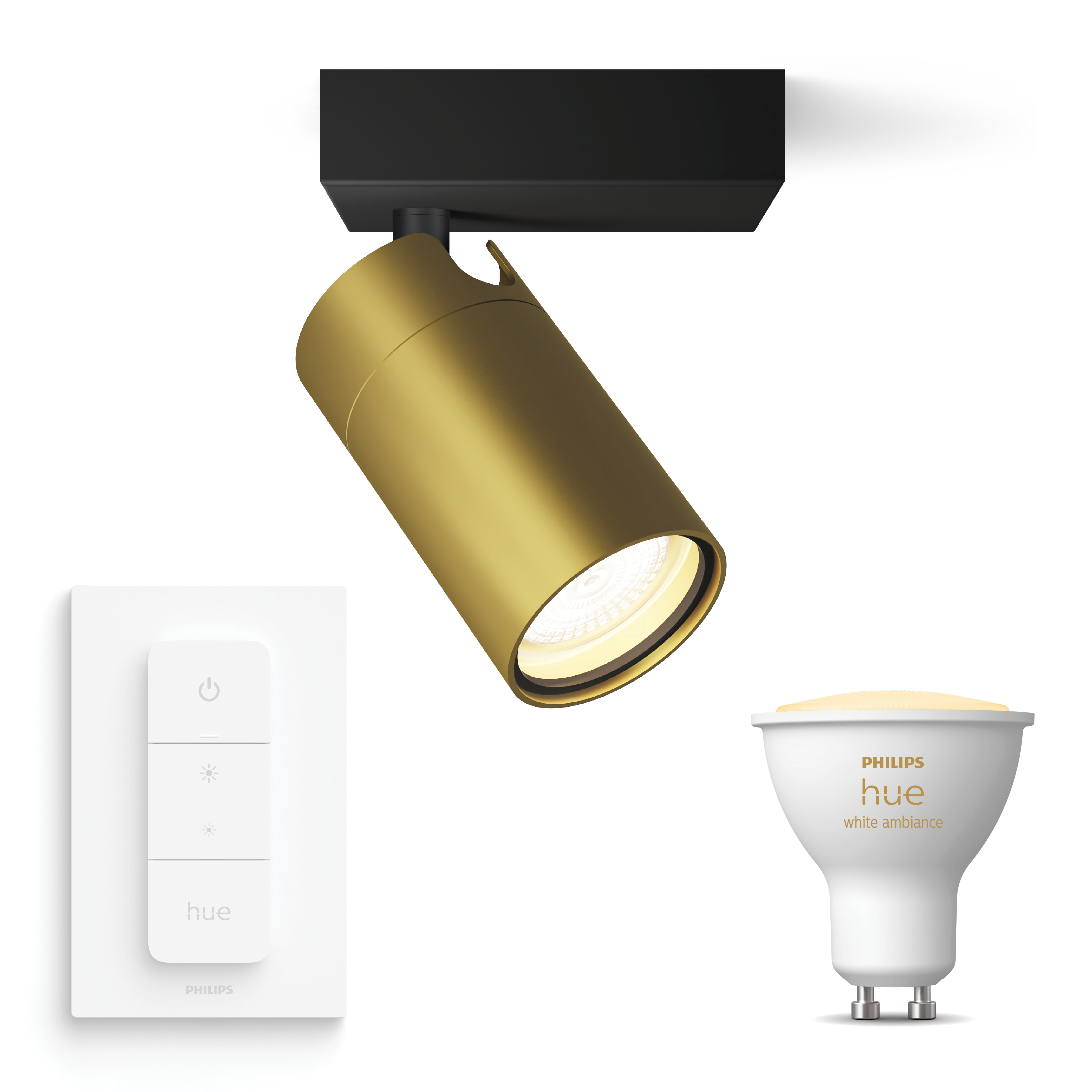 Gouden spot met wit licht, witte afstandsbediening en witte gloeilamp op witte achtergrond.