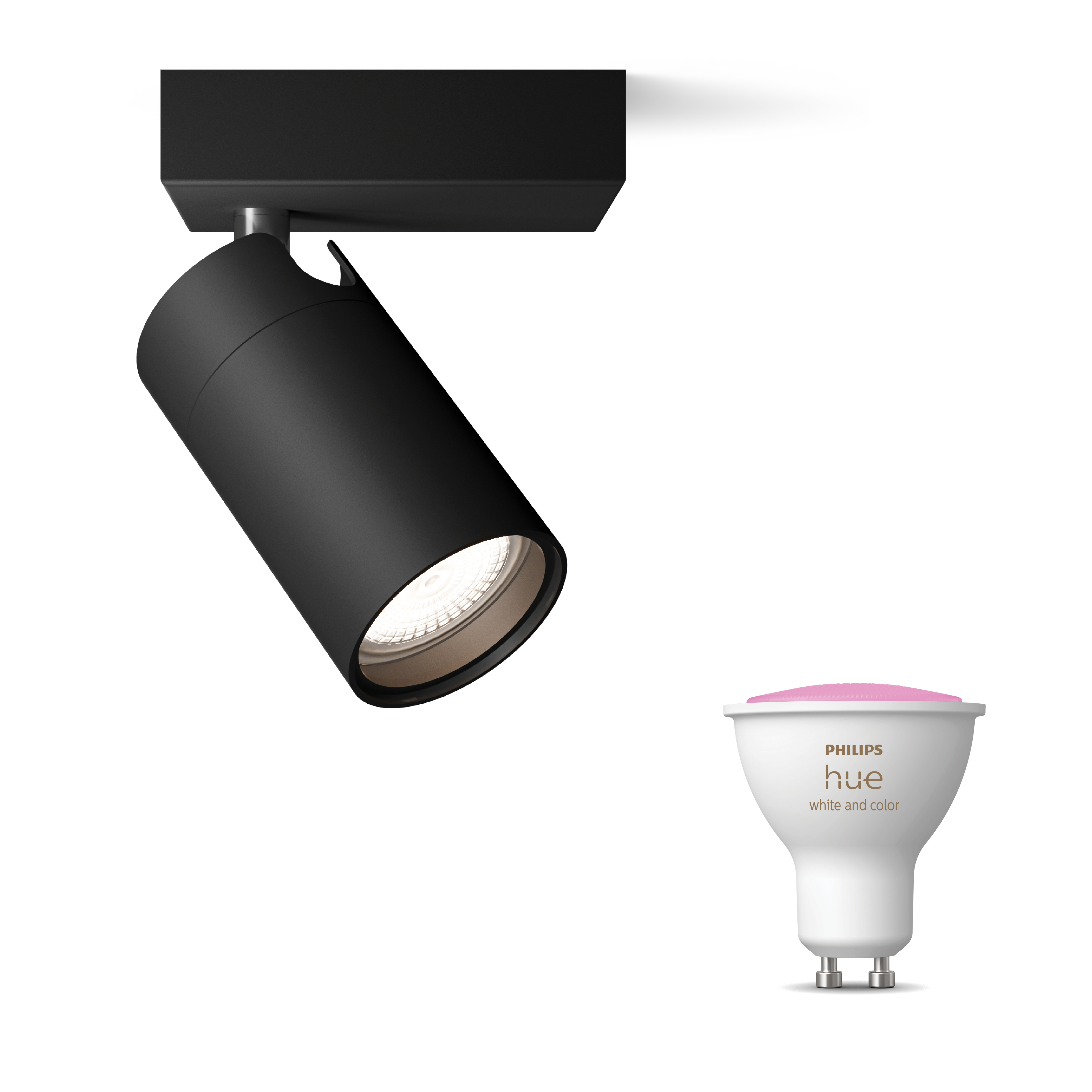 Zwarte spot en een witte en roze Philips Hue lamp.